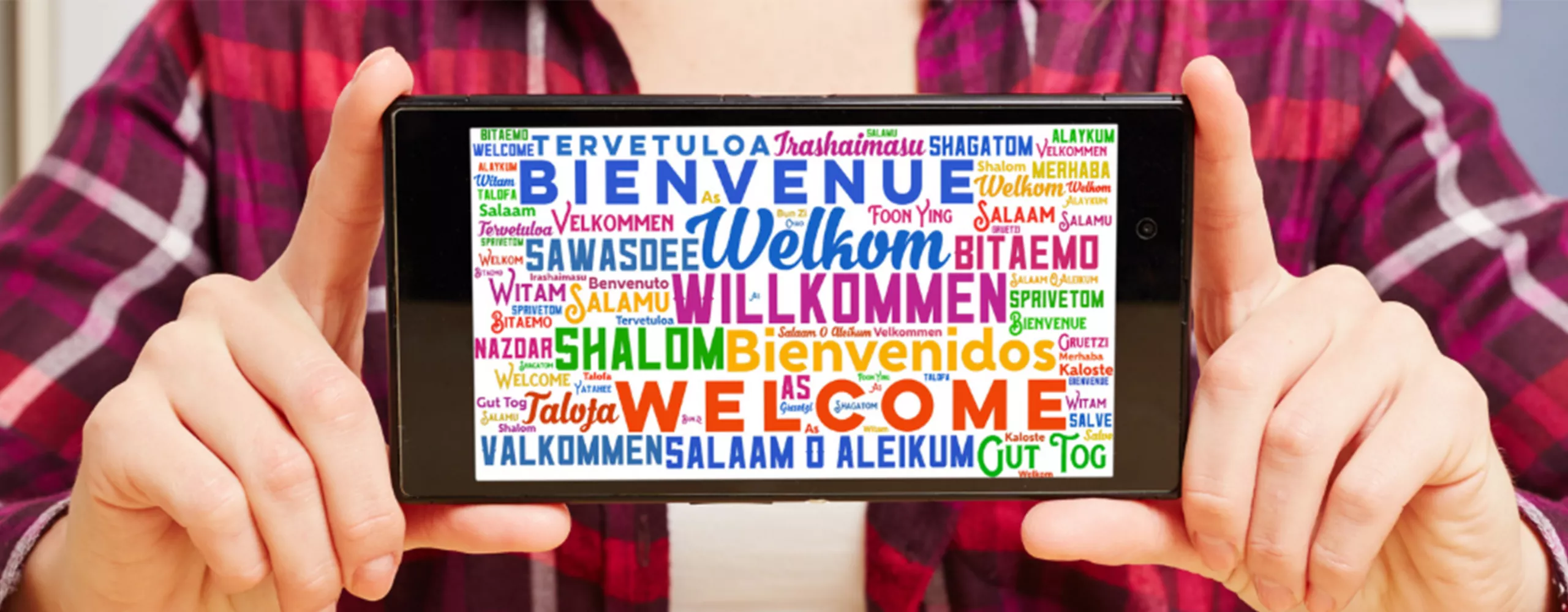 Phone showing "Welcome" Image