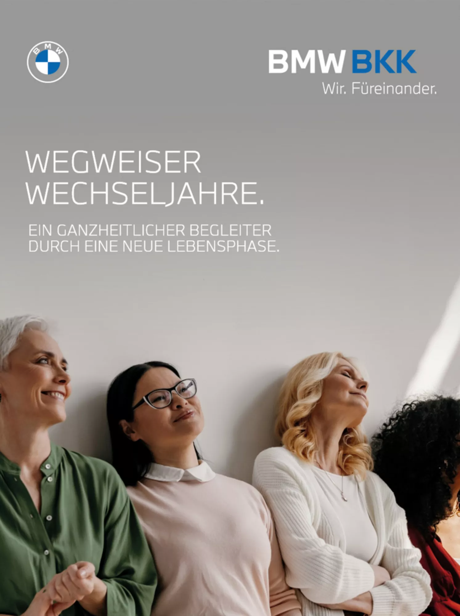 Schwangere Frau und Mann auf Gymnastikbällen