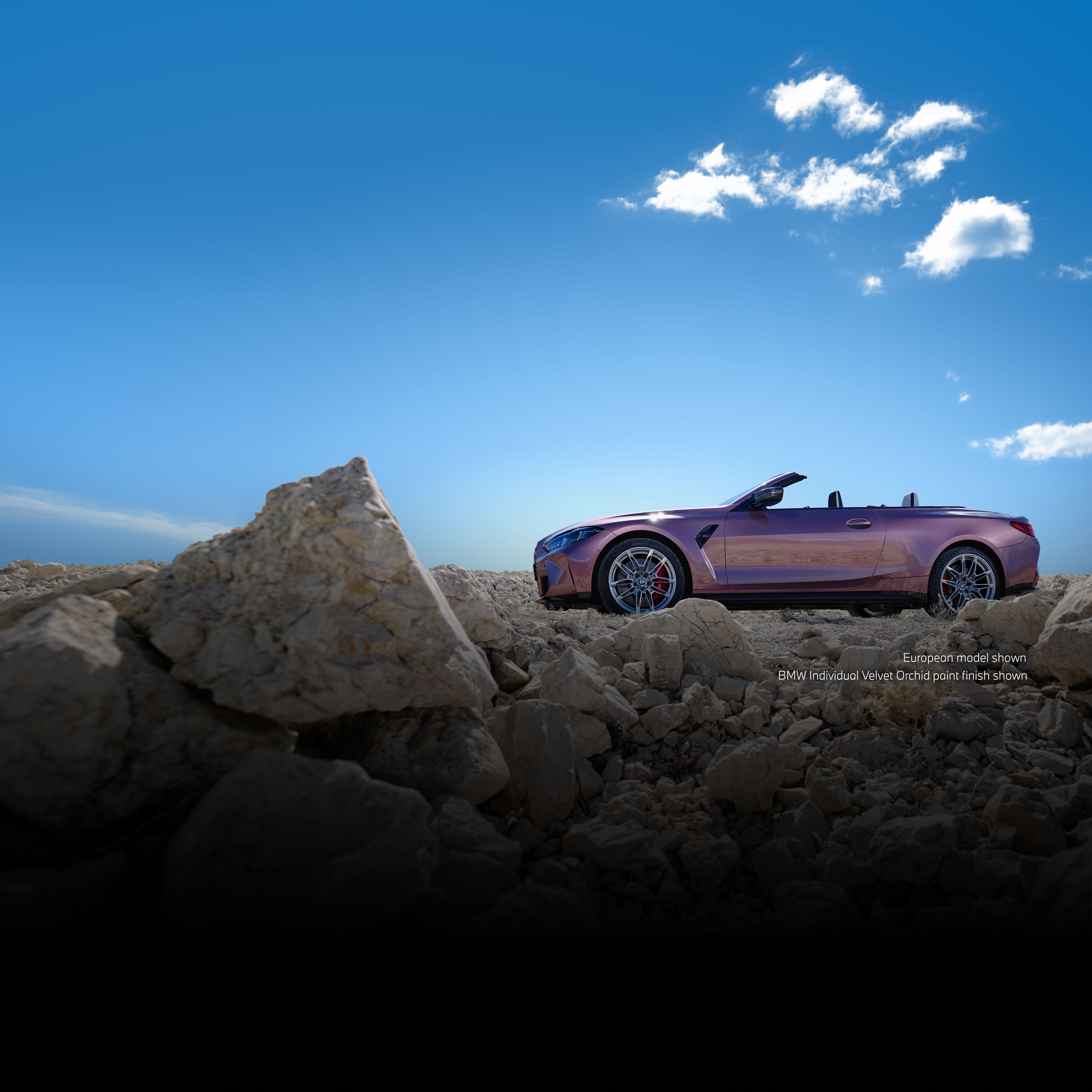 Exterior of the BMW M4 Competition M xDrive Convertible in BMW Individual Velvet Orchid paint finish