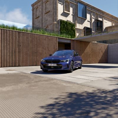 BMW 3 Series Touring M Models blue front view