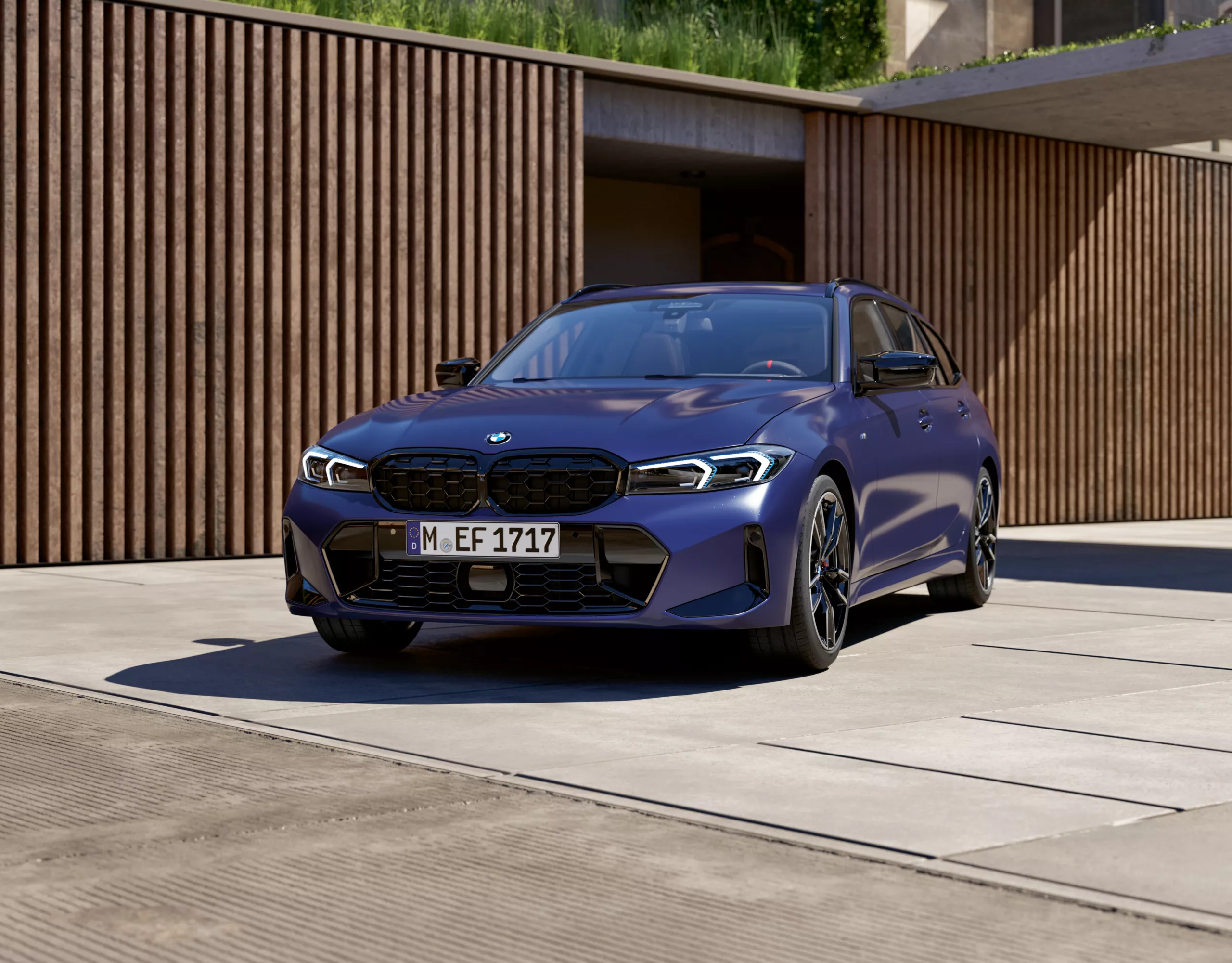 BMW 3 Series Touring M Models blue front view