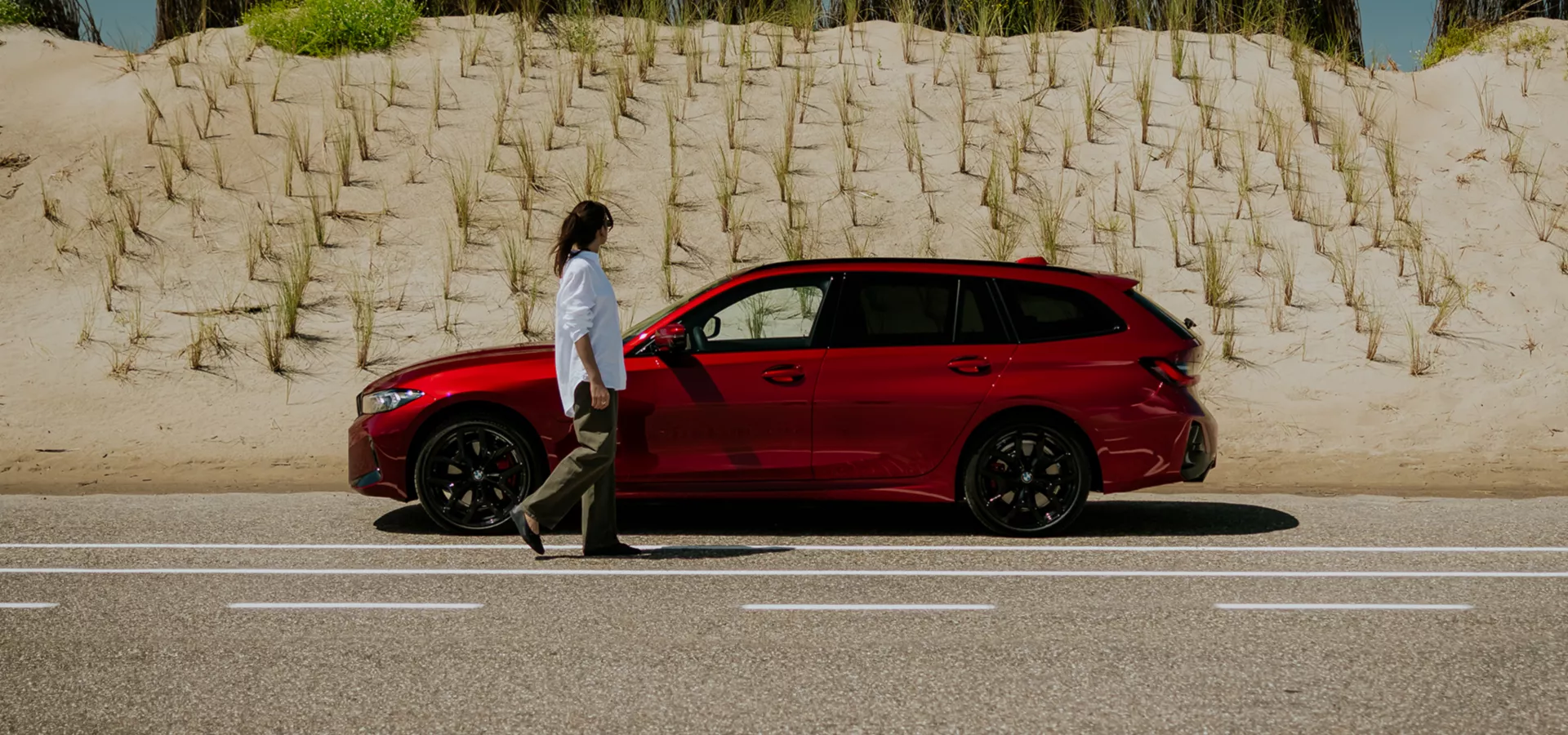 Ein roter BMW 3er Touring