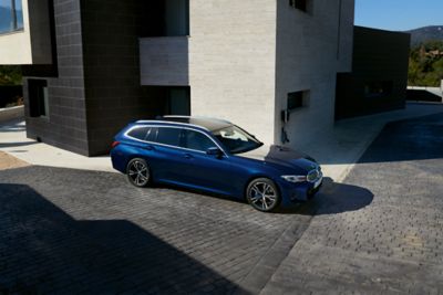 BMW 3 Series Touring Plug-in Hybrid blue front view