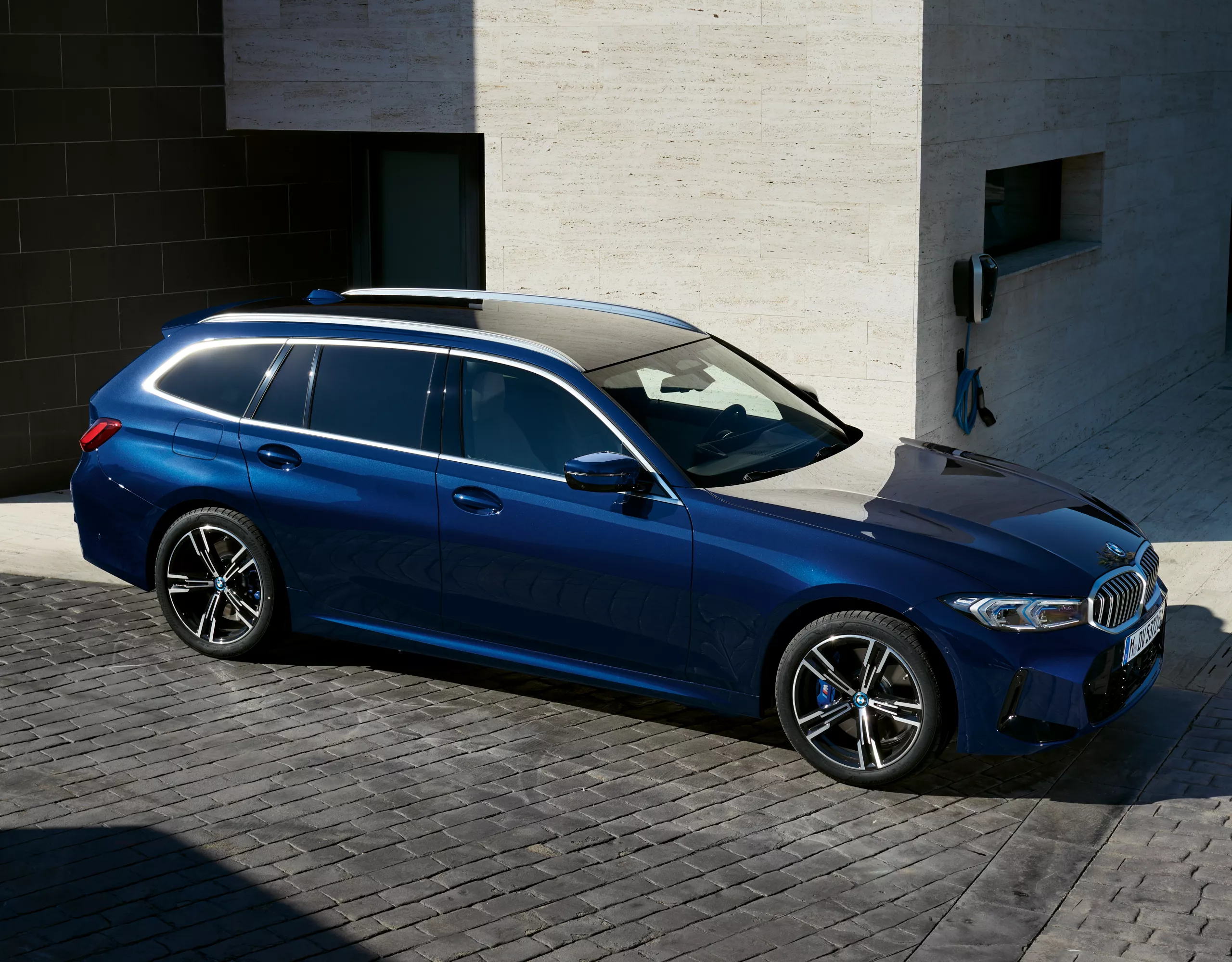BMW 3 Series Touring Plug-in Hybrid blue front view