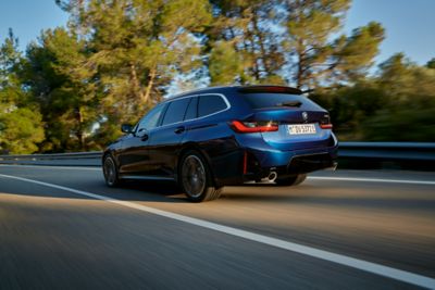 BMW 3 Series Touring Plug-in Hybrid blue rear view