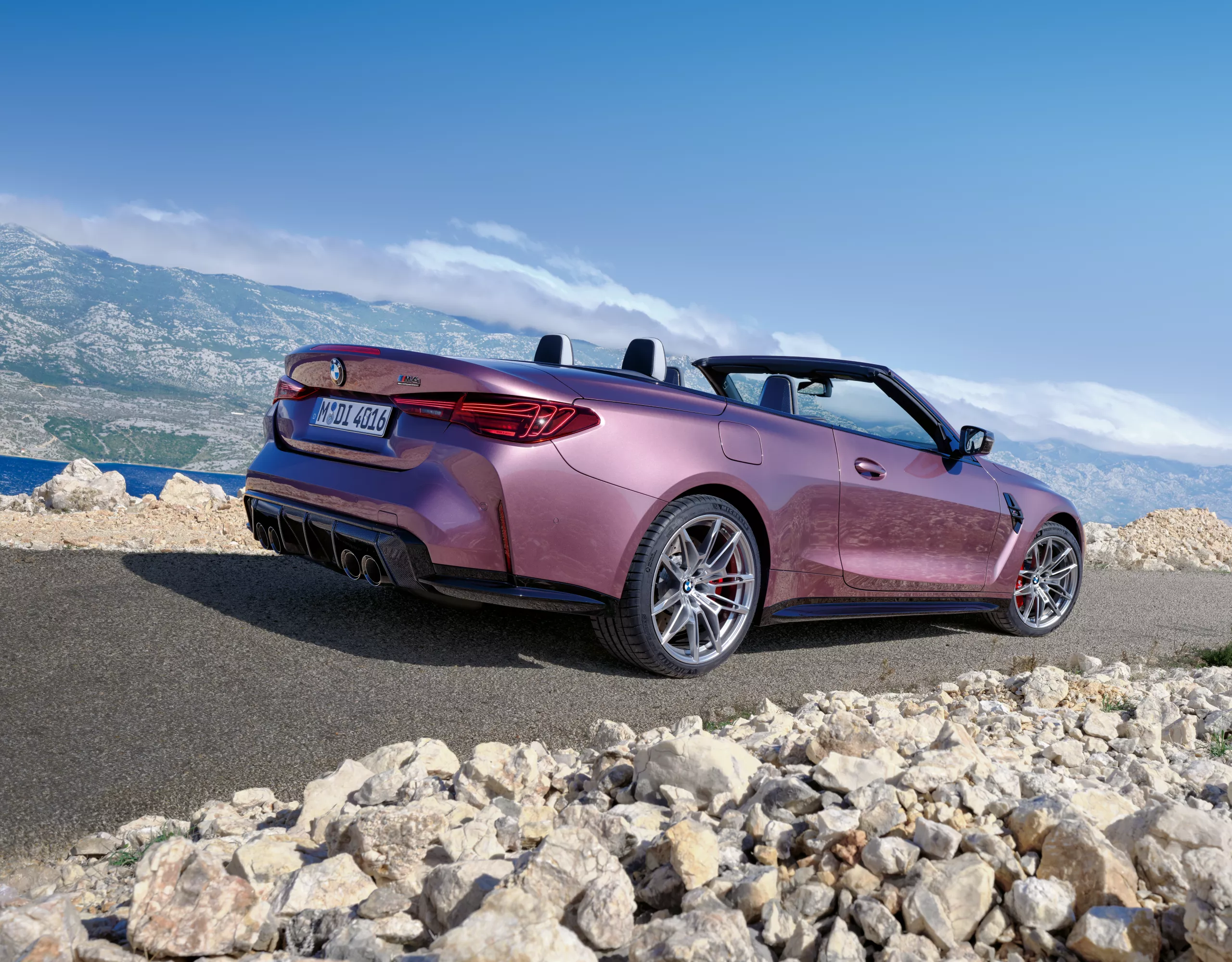 BMW M4 Competition Convertible pink rear view