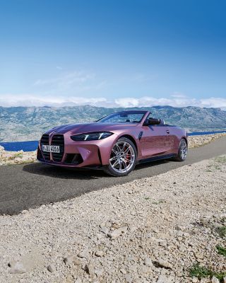 BMW M4 Competition Convertible pink front view 