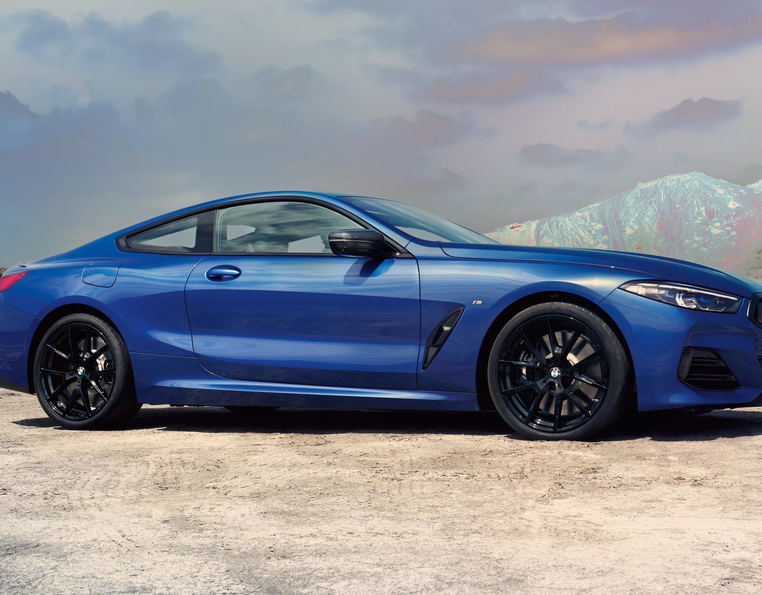 BMW 8 Series Coupé M blue front view 