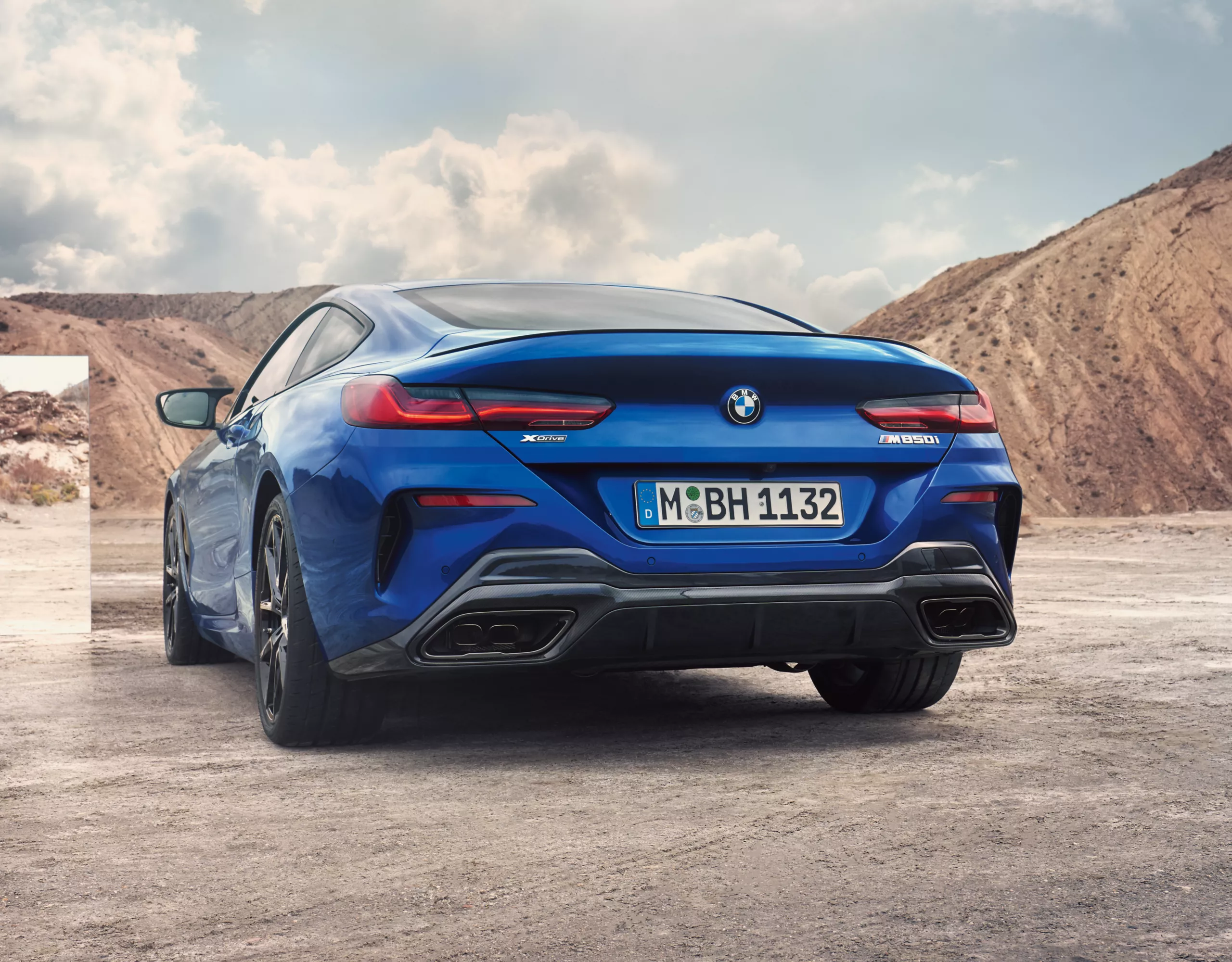 BMW 8 Series Coupé M blue rear view 