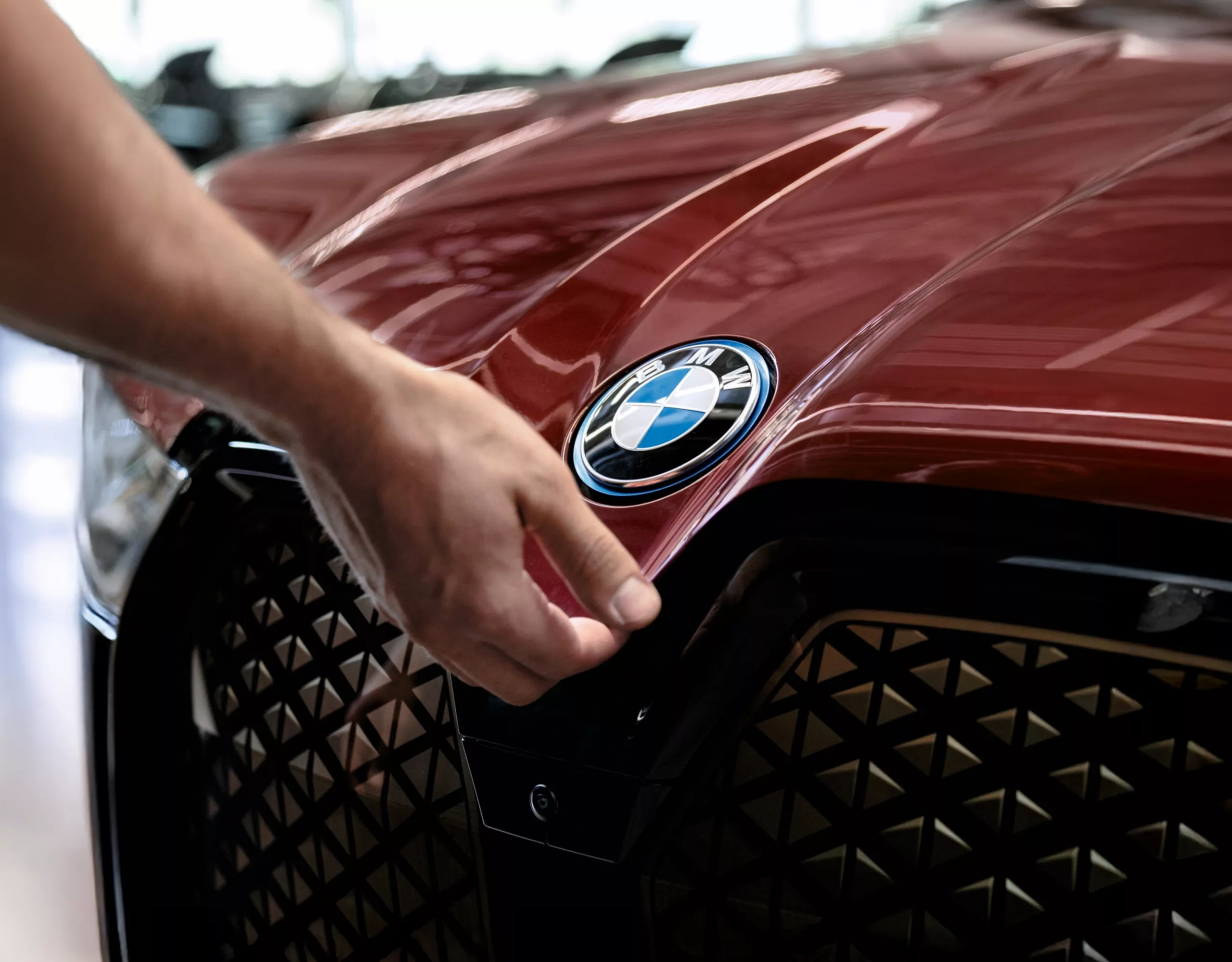 Close-up of BMW car hood emblem