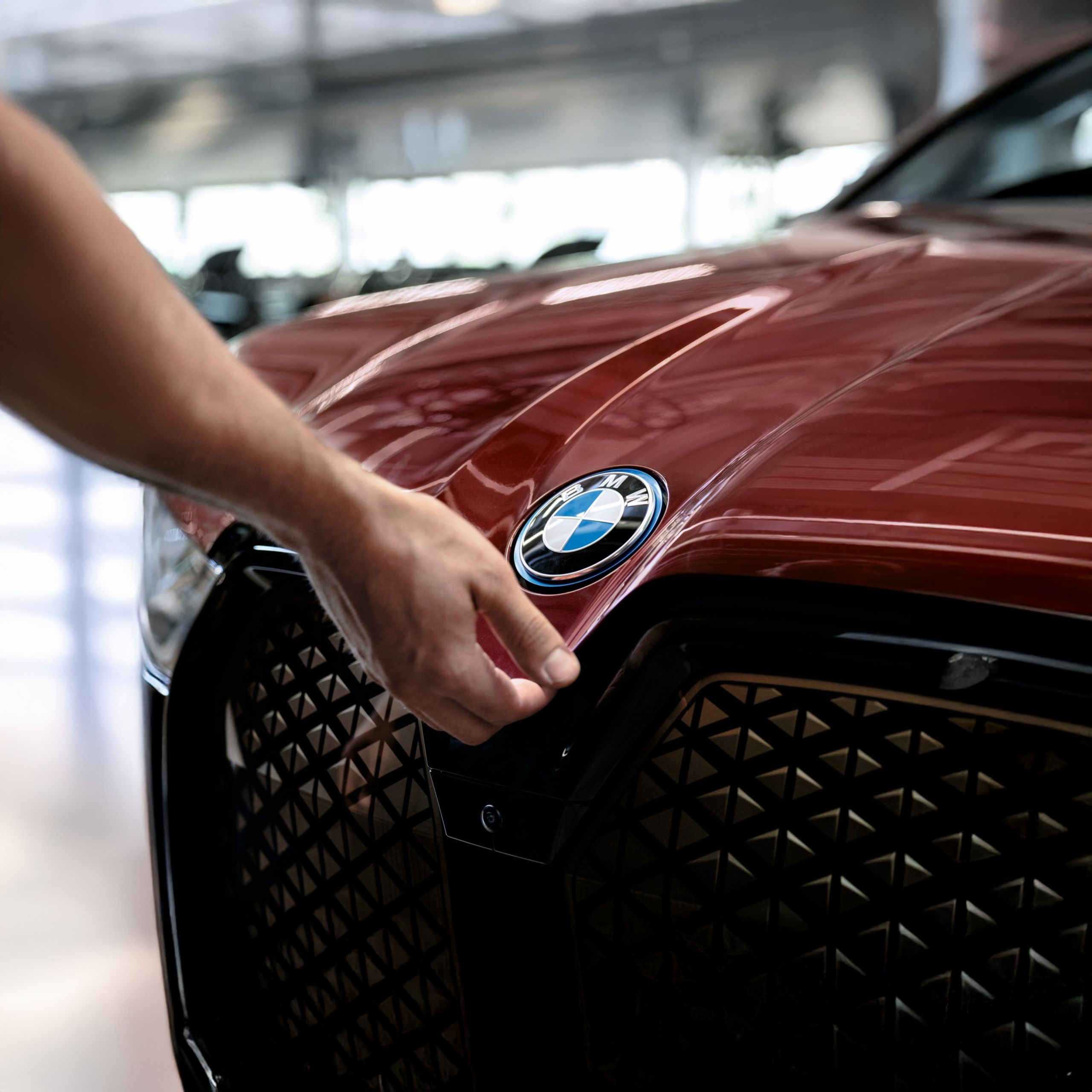 Close-up of BMW car hood emblem
