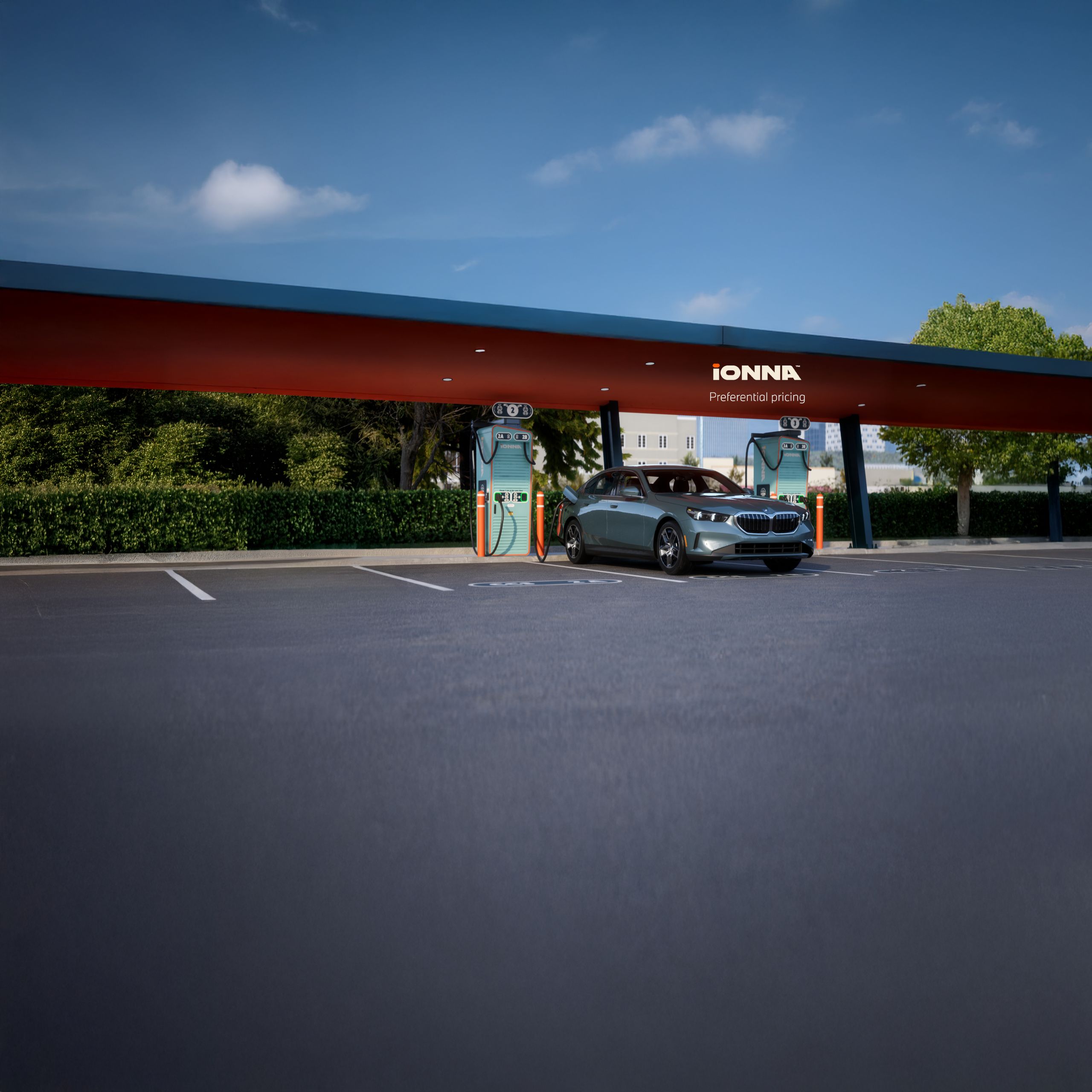 The BMW i5 Sedan parked at an IONNA charging station.
