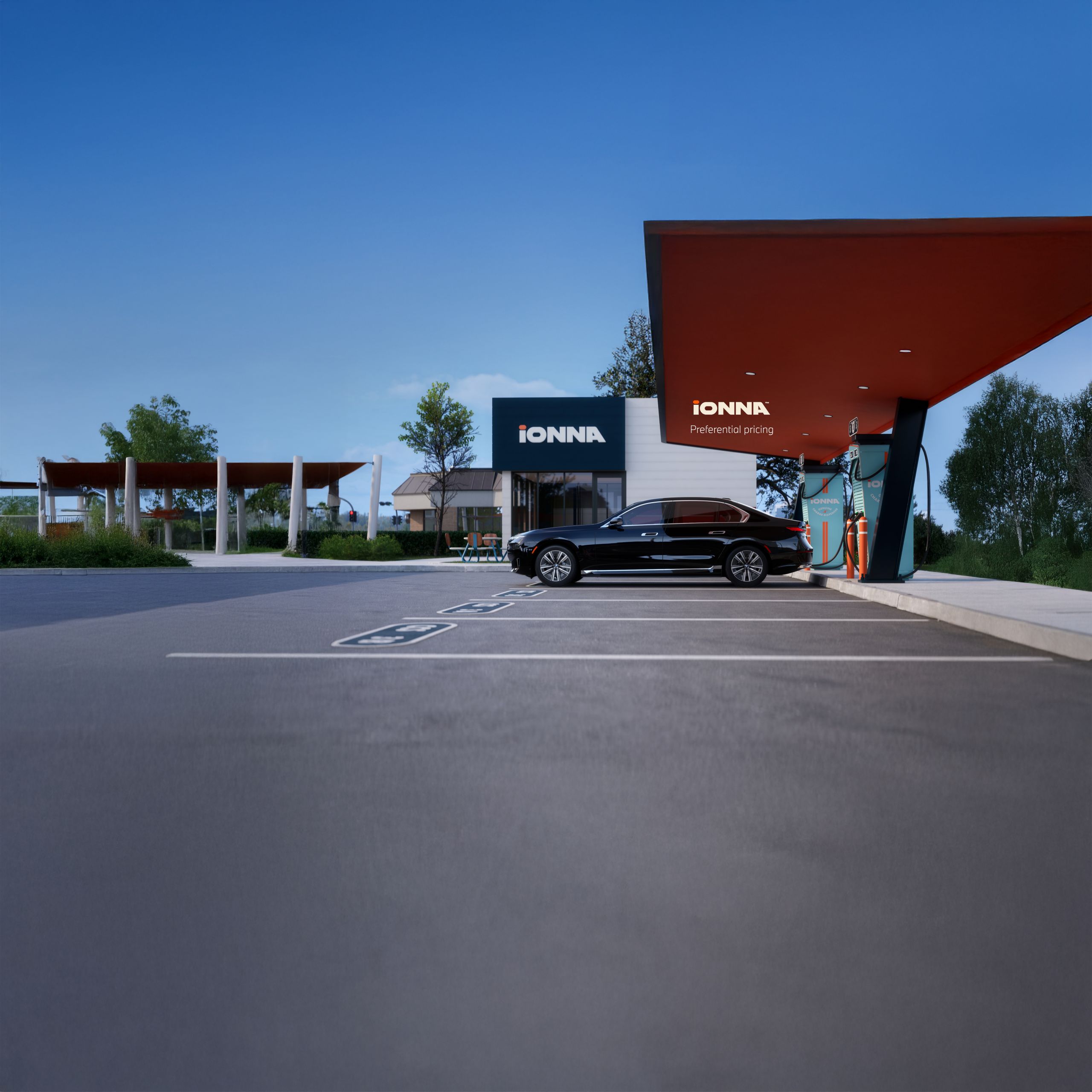 The BMW i7 Sedan parked at an IONNA charging station.