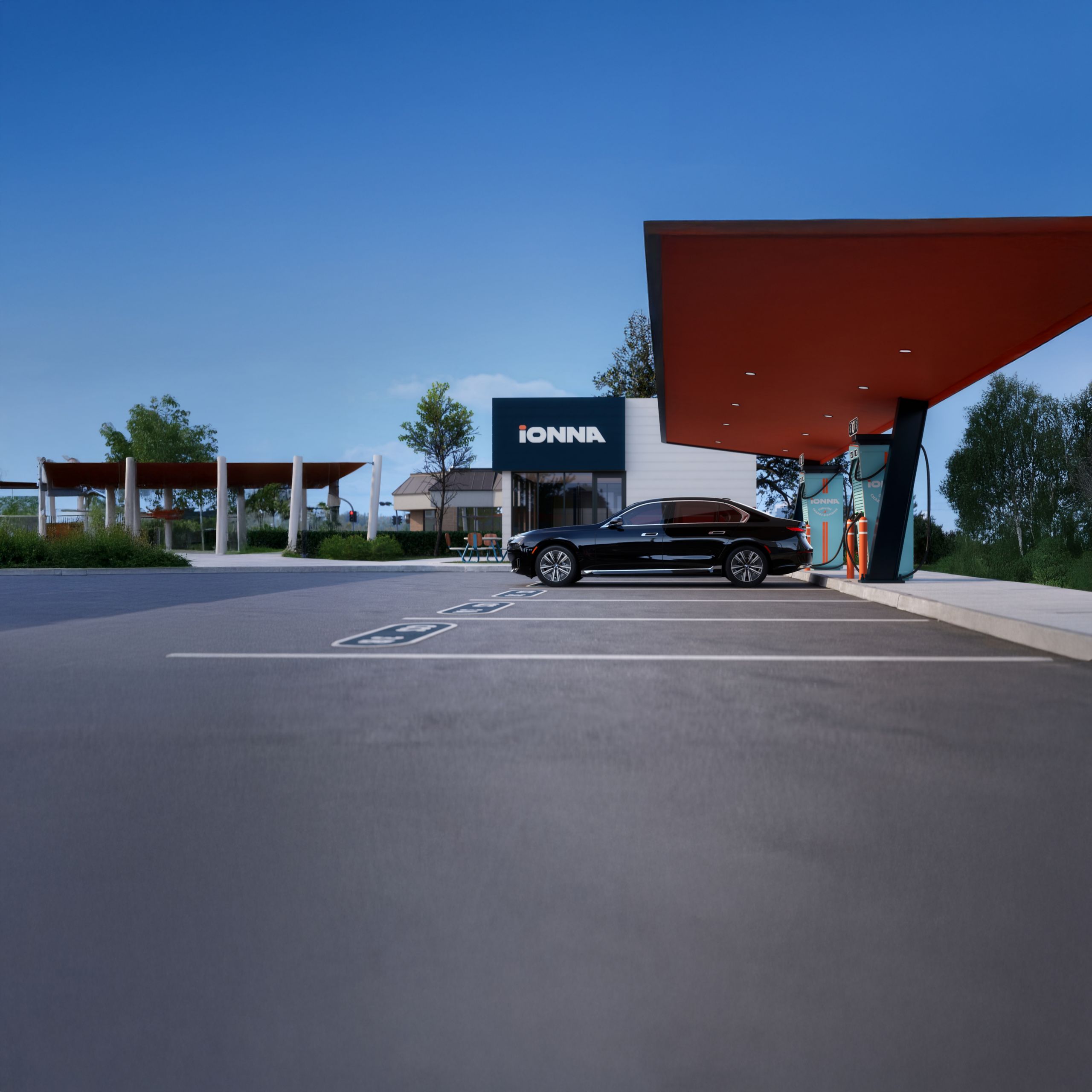 The BMW i7 Sedan parked at an IONNA charging station.