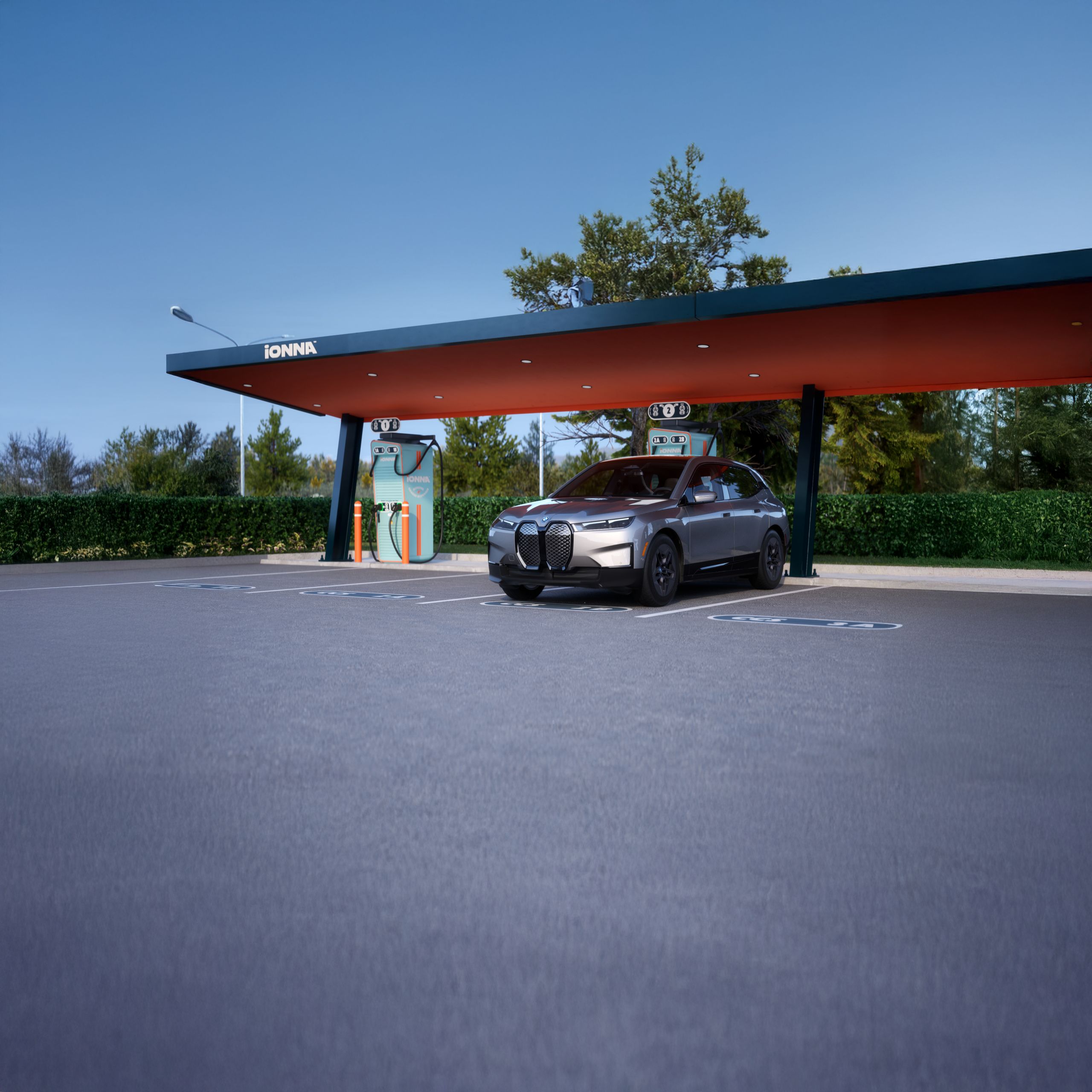 A BMW Certified iX charges at an IONNA charging station.