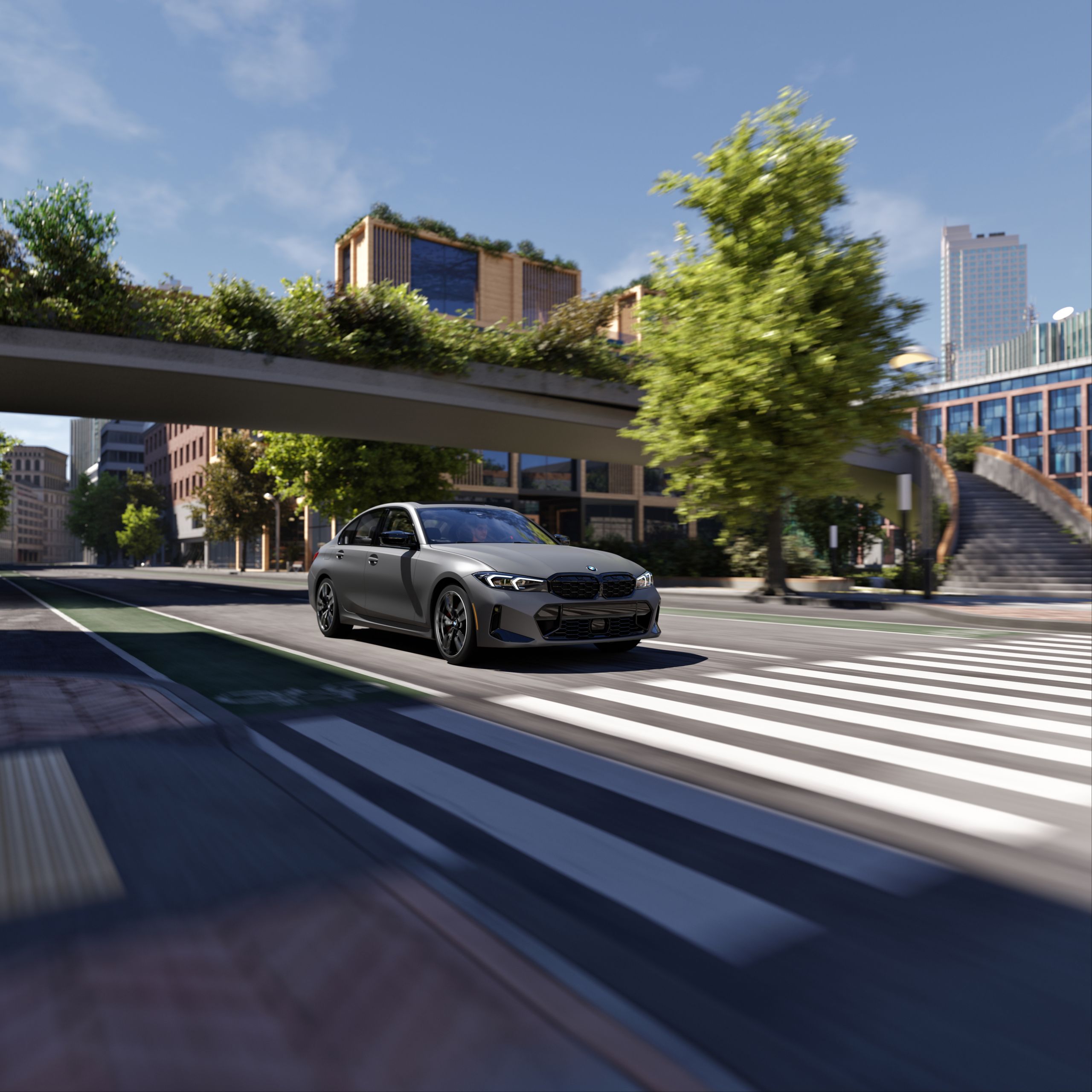 A BMW M340i Sedan driving down a city street