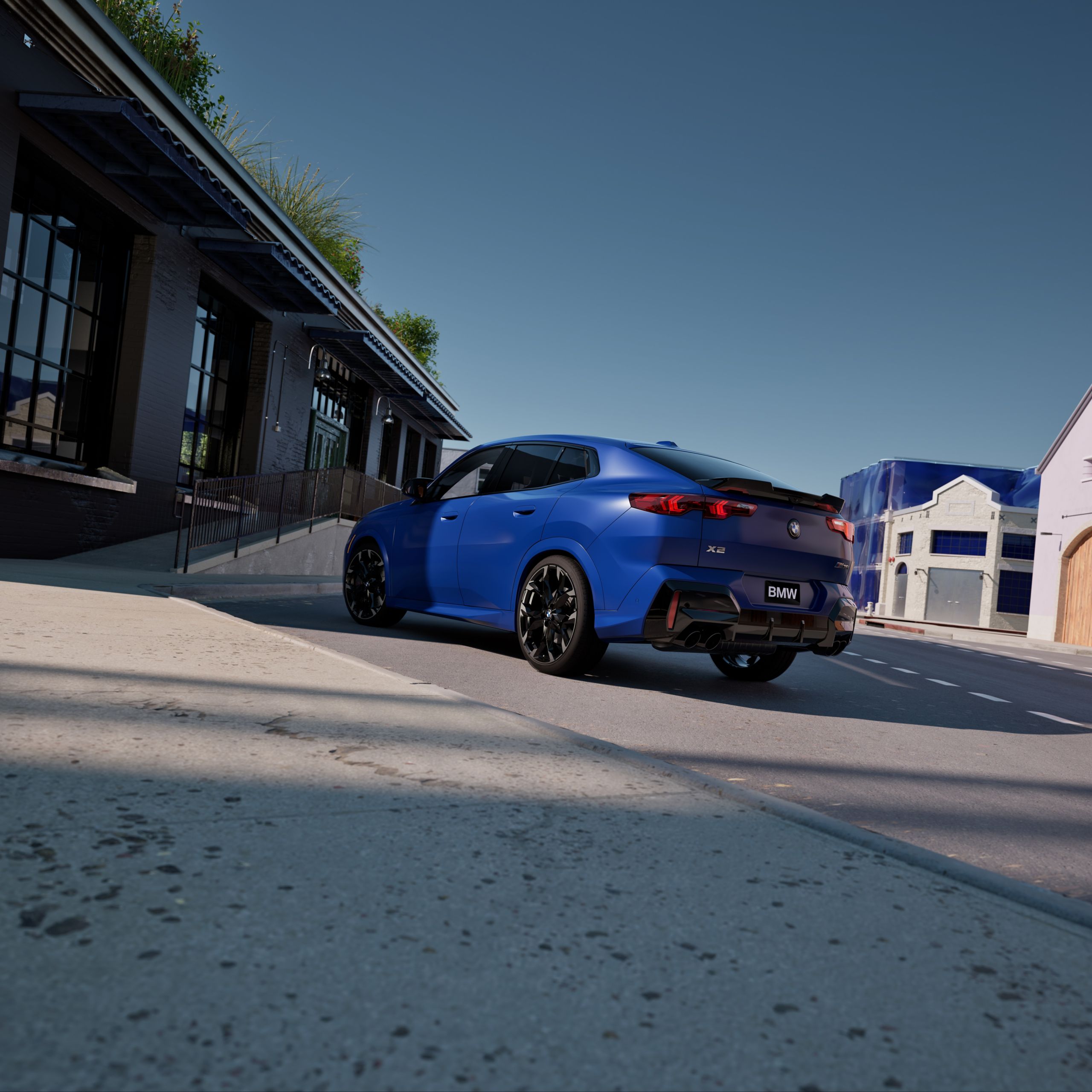 Dramatic low-slung view of the M35i parked in an urban setting