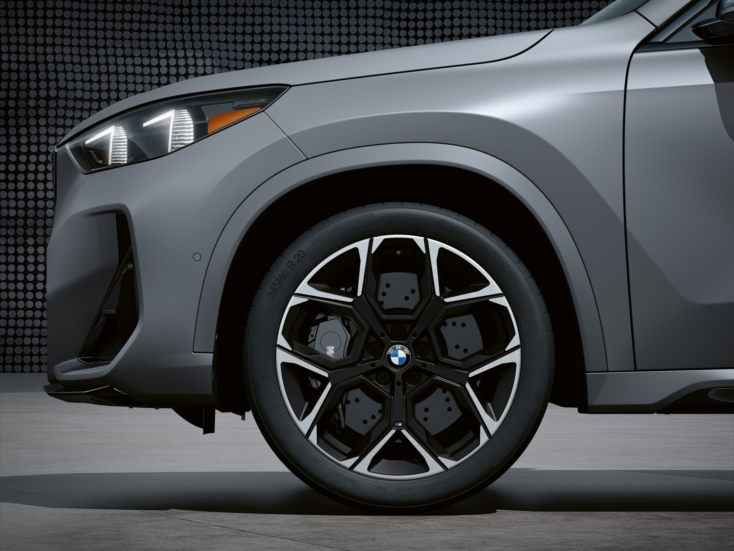 Close up of the BMW X1 M35i's available 20” Y-spoke style Bicolor 872M Wheels.