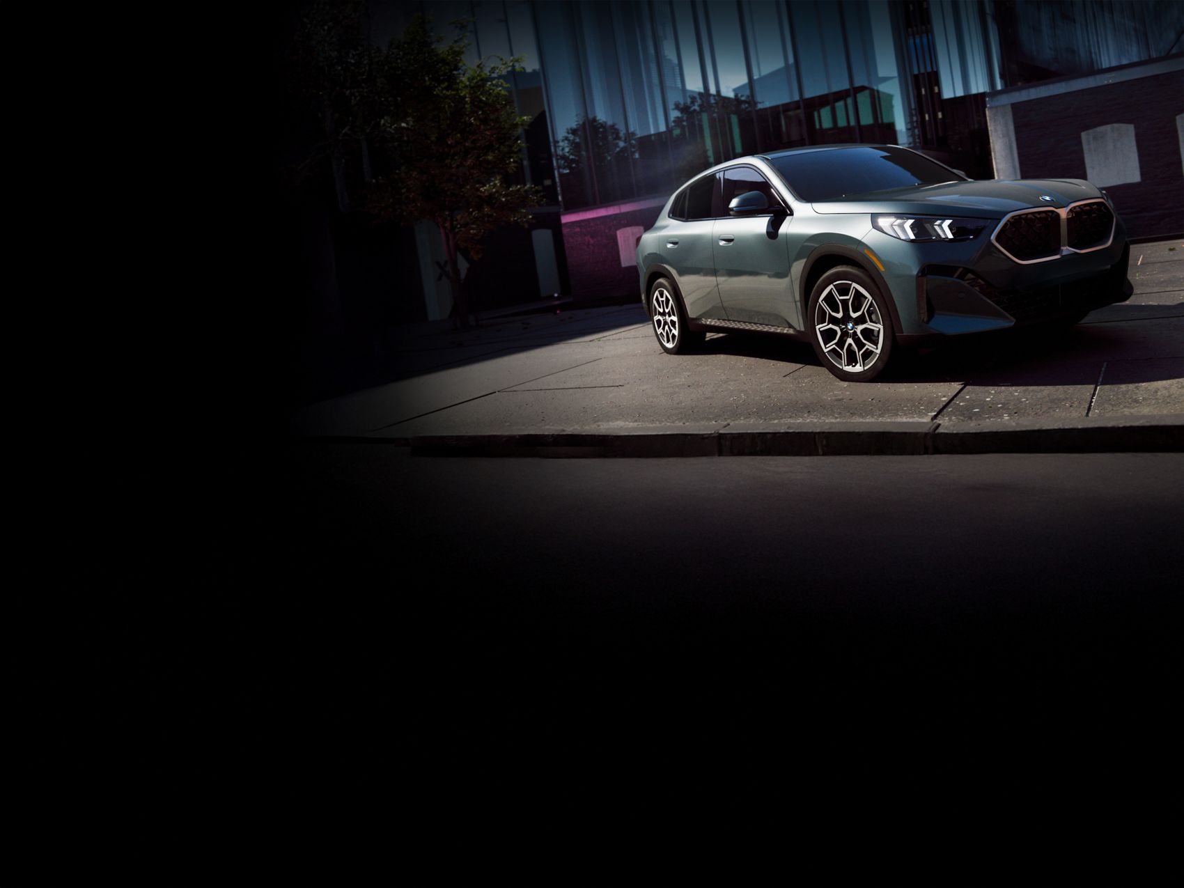 2027 BMW X2 Coupe SUV parked at night