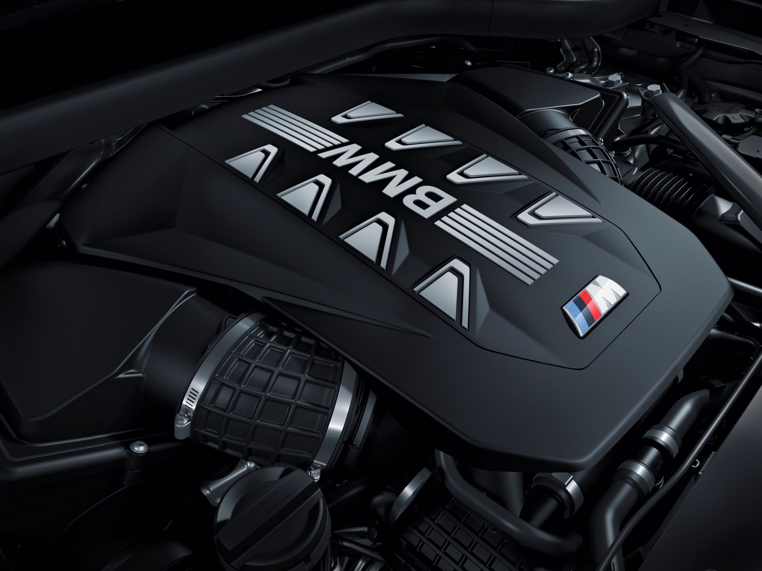 Engine cover of the BMW X6 M60i xDrive M TwinPower Turbo V8-cylinder petrol engine in detail