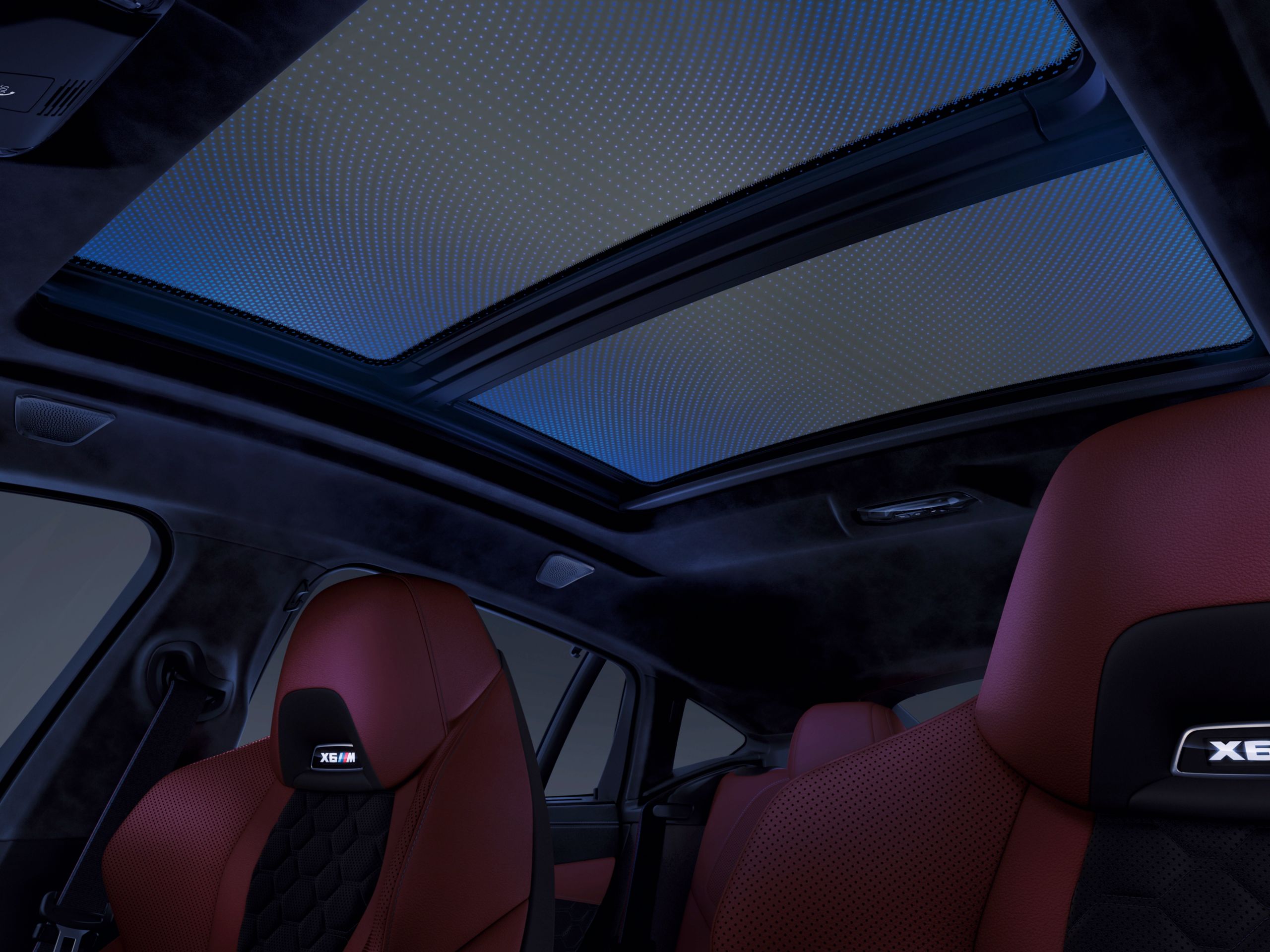 View of the sky from inside through the panoramic glass sunroof