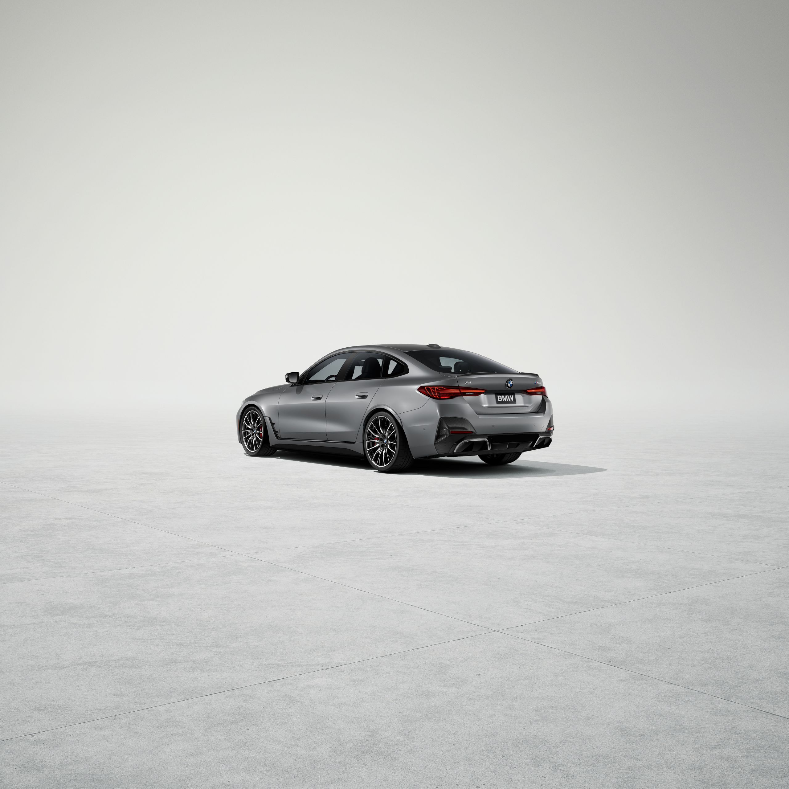 Exterior of the BMW i4 M60 Gran Coupe in BMW Individual Frozen Pure Grey