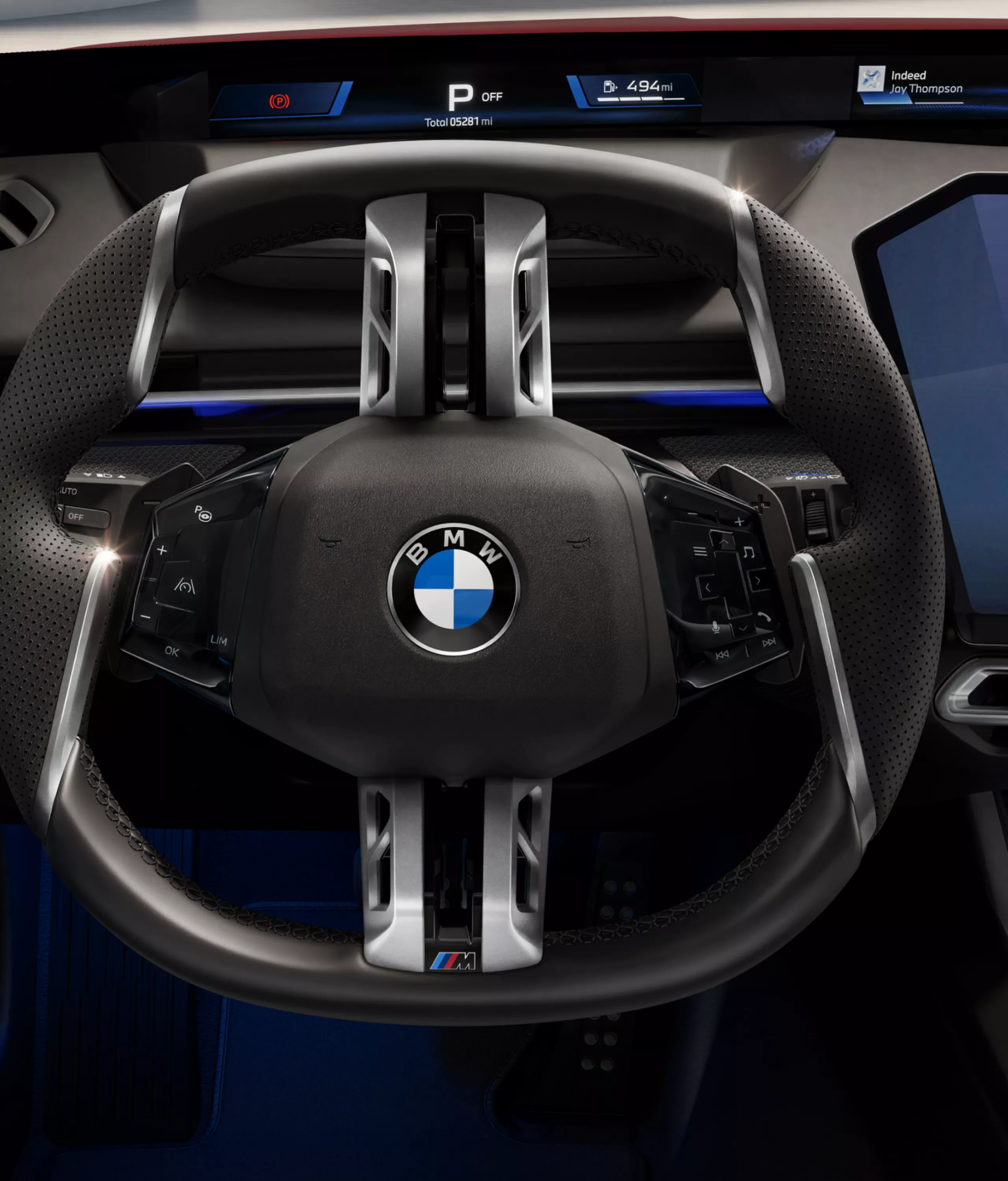 Cockpit from the driver's perspective, with the sports steering wheel in the center.
