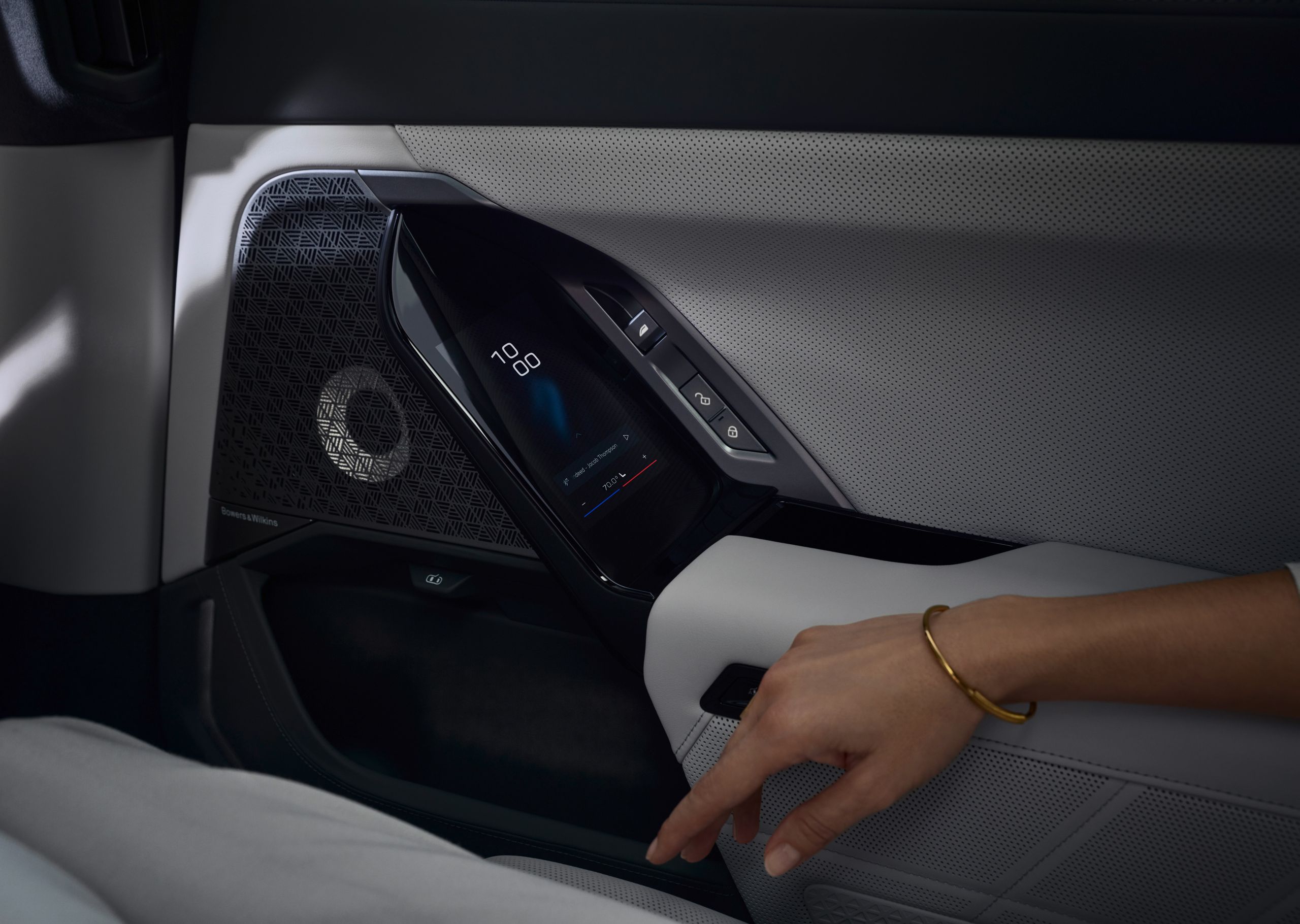 Close-up of BMW Touch Command in a rear door armrest.