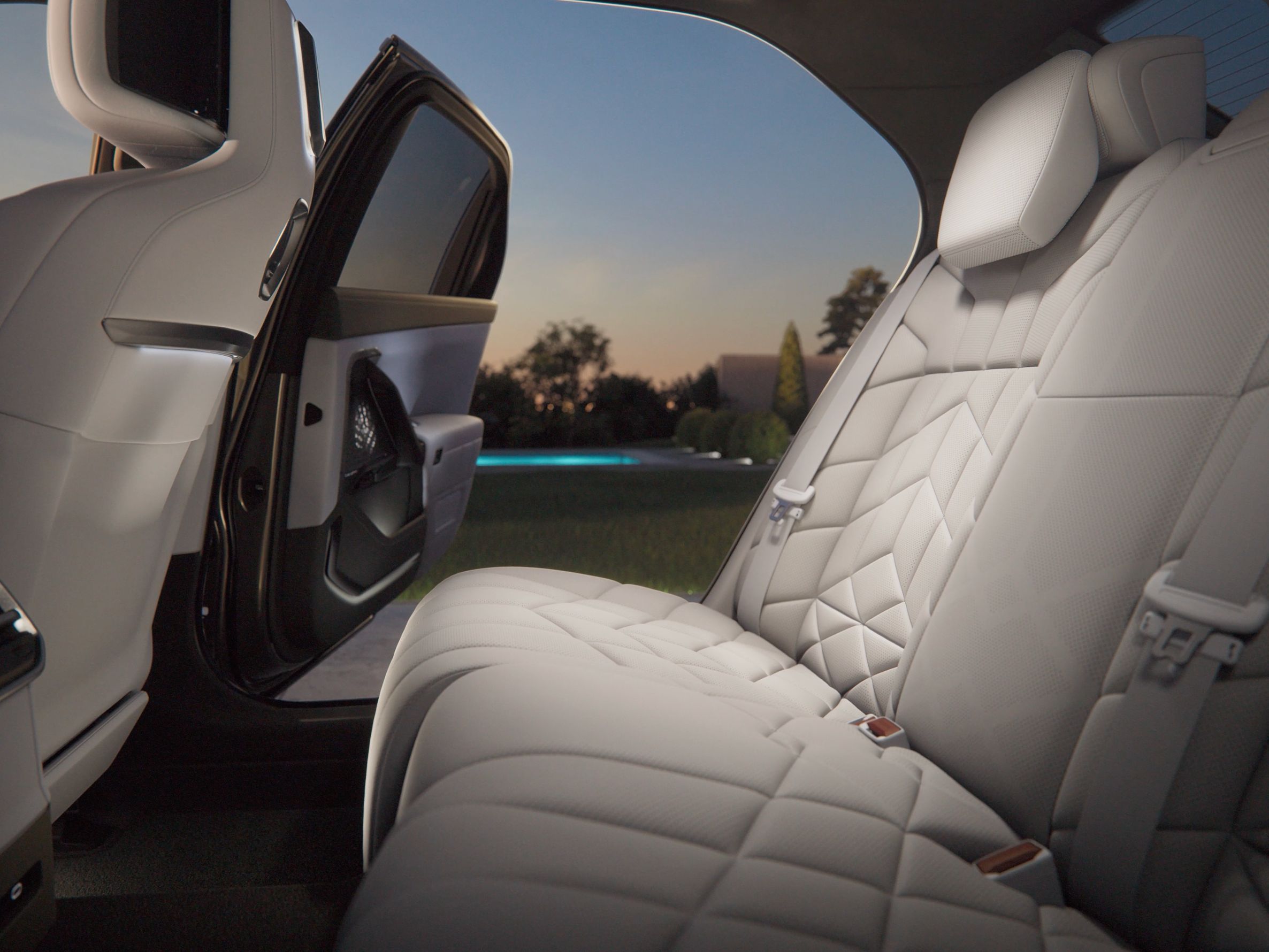 The interior of the 7 Series, showing the rear passenger seating and Executive Lounge features.