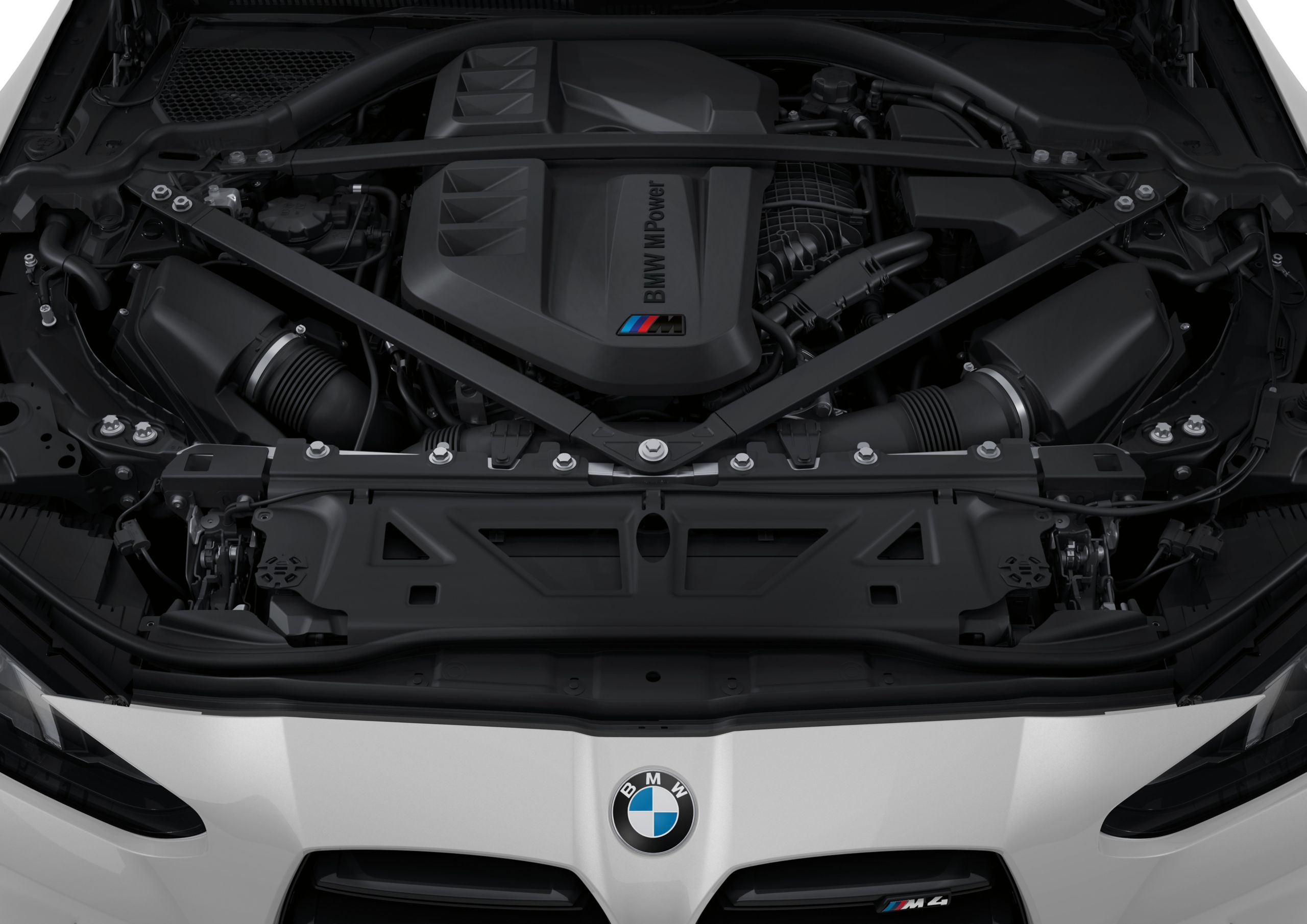The BMW M TwinPower Turbo inline 6-cylinder engine in the BMW M3 Competition Sedan