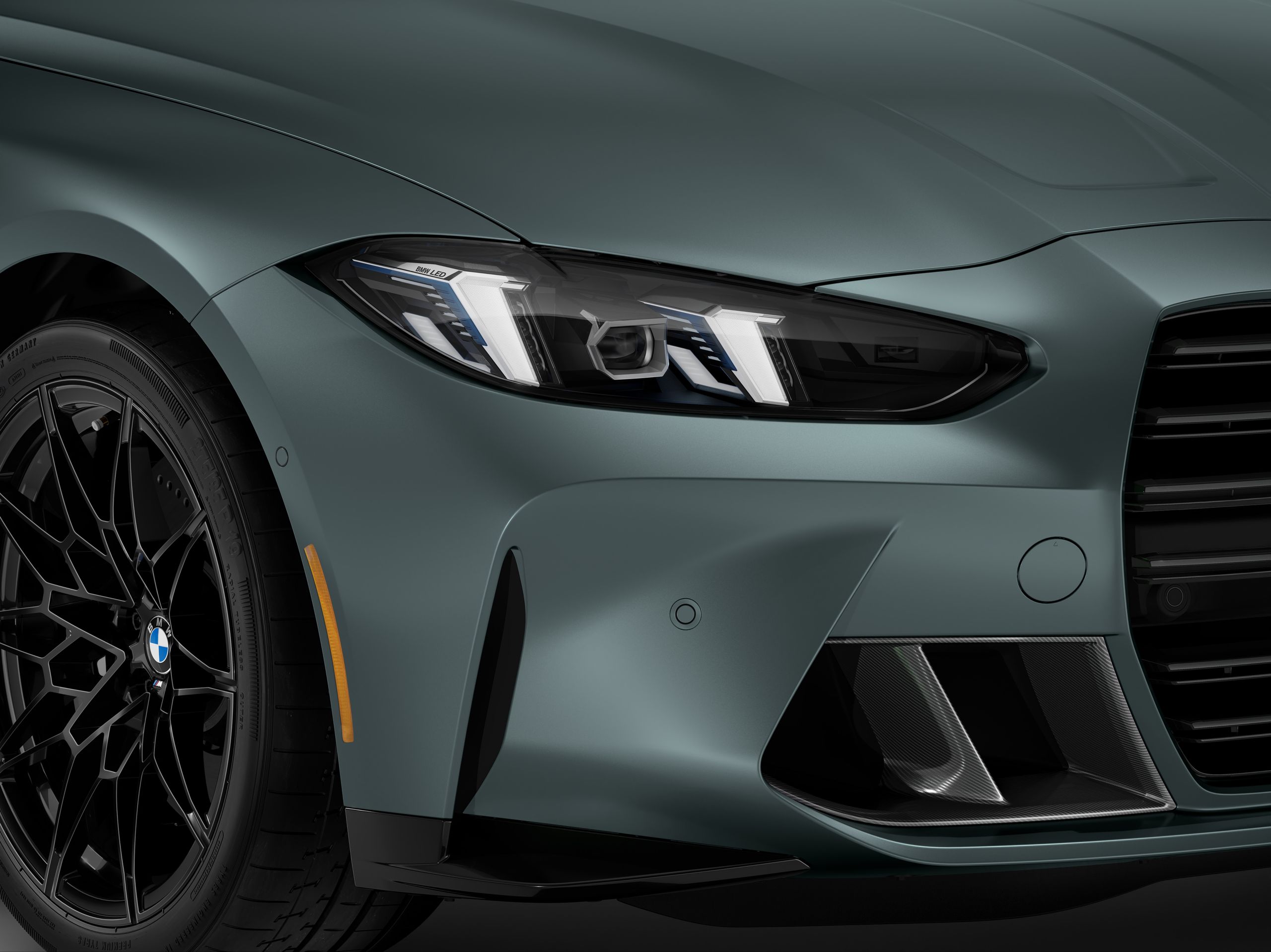 Close-up of an adaptive LED headlight on the BMW M3 Sedan