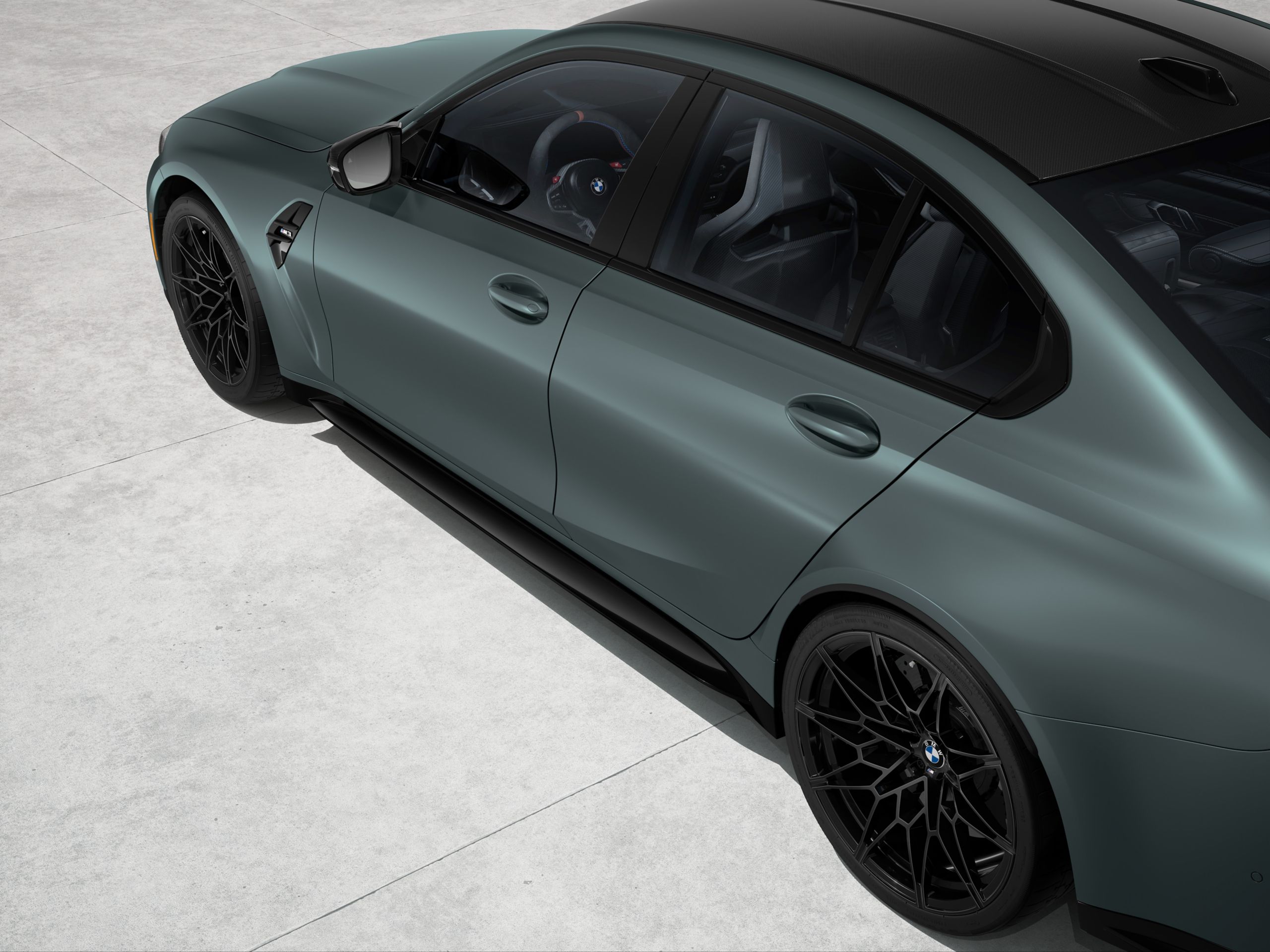 Elevated down angle focusing on the left side of the BMW M3 Sedan