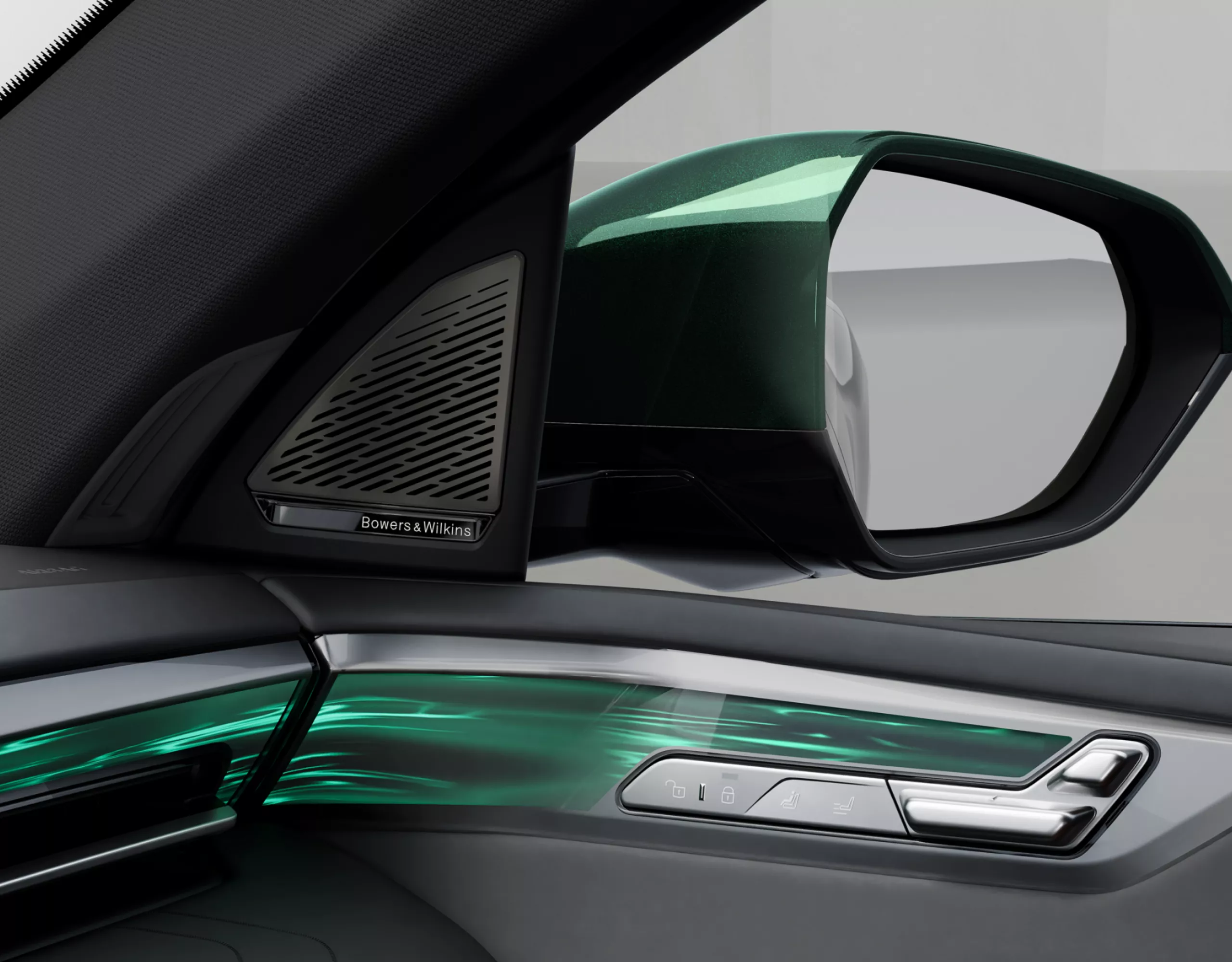 Inside of the door with controls and speaker