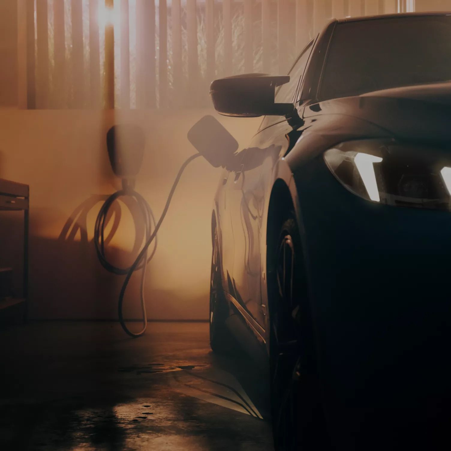 A BMW plugged into a BMW Wallbox inside a garage.