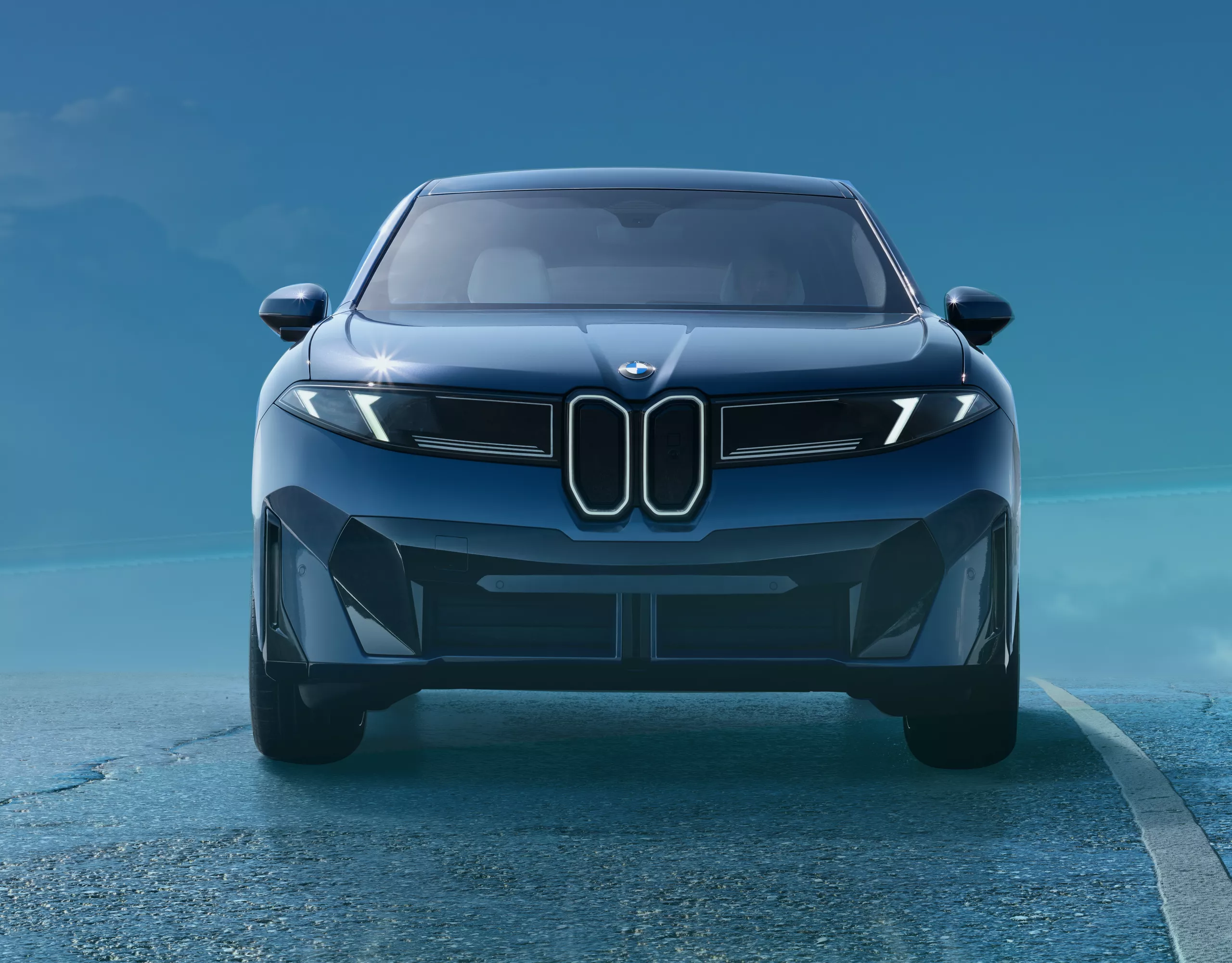 A collage of three images: the front of the BMW iX3, a BMW branded golf ball, and a wide shot of a lush golf course.