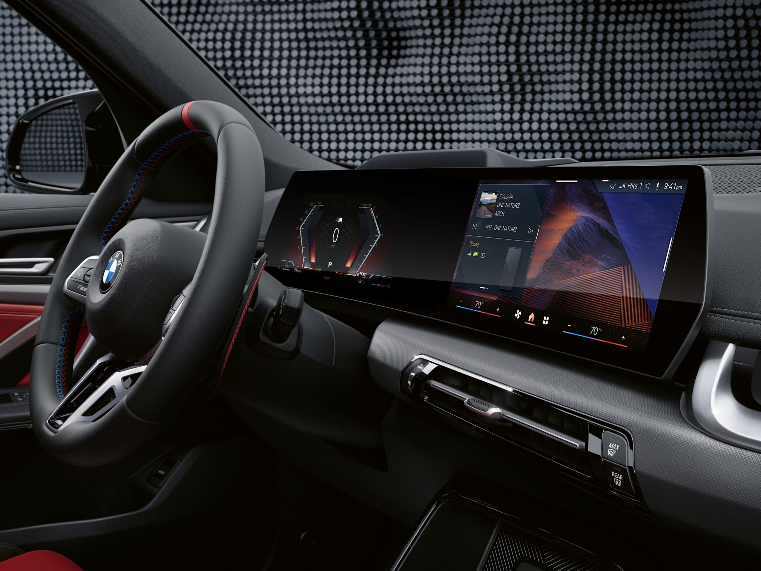 Interior shot of the 2026 BMW X1 M35i's dashboard with Curved Display and M-specific displays.