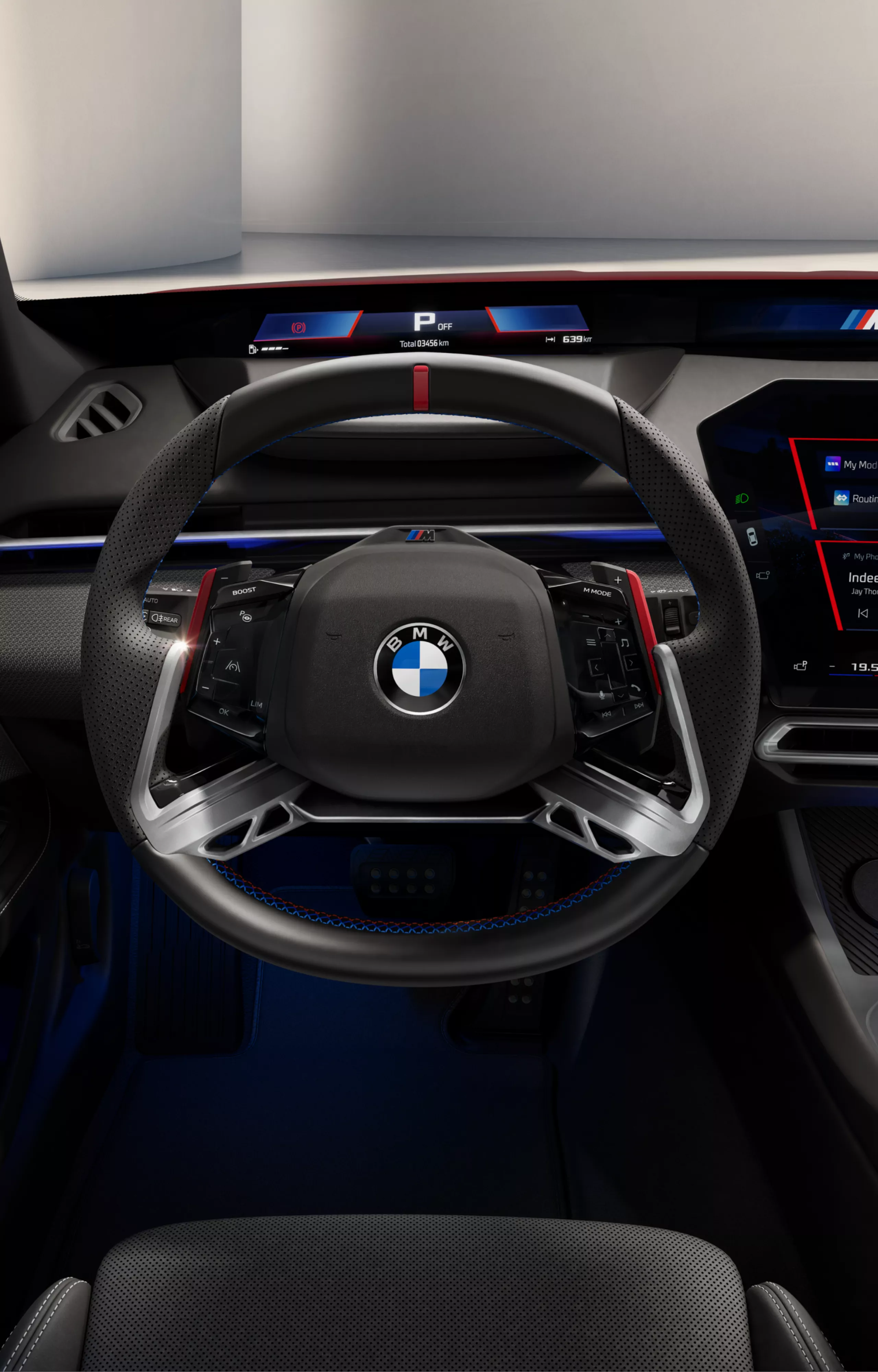 Cockpit from the driver's perspective, with the M steering wheel in the centre.