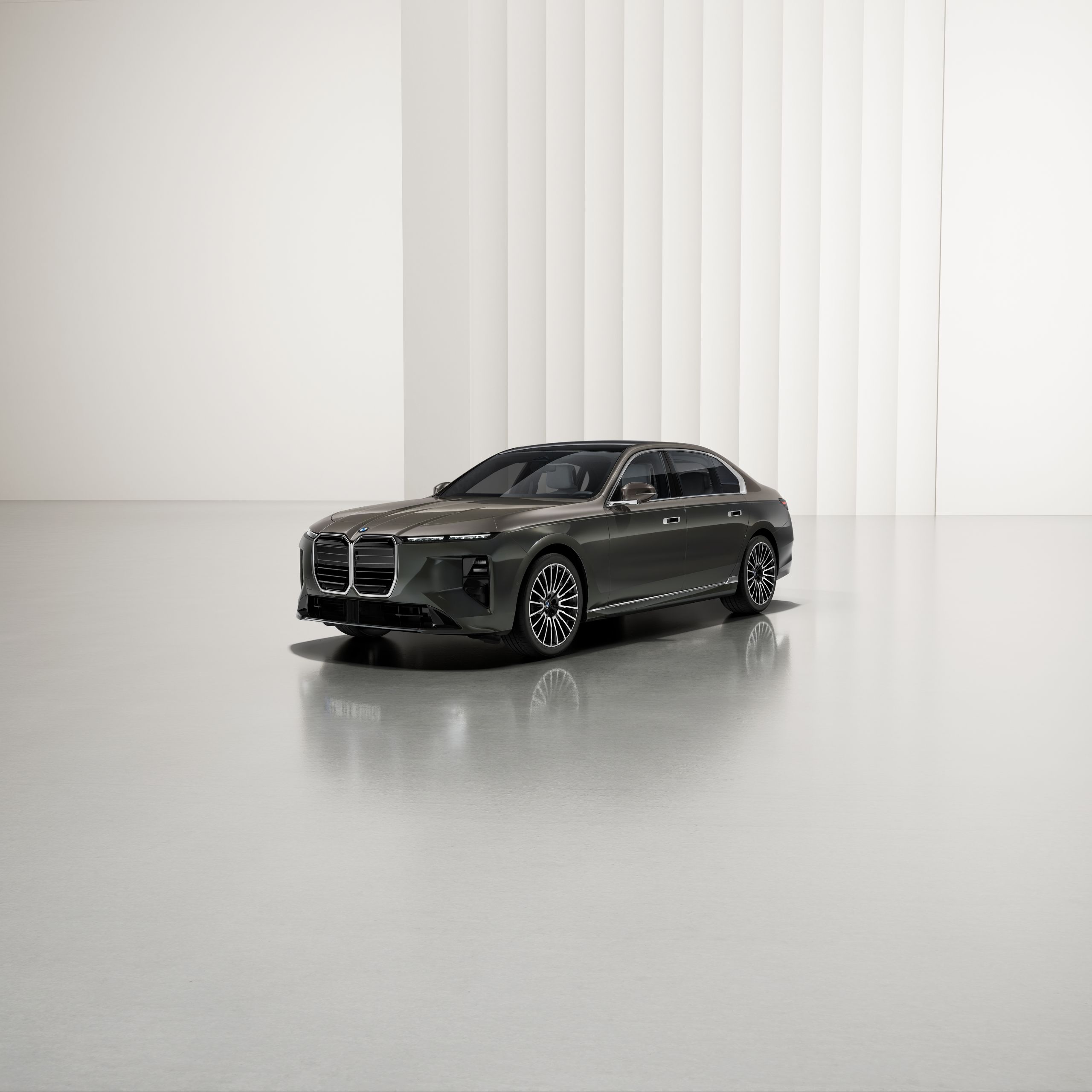 Vehicle is stationary at an angle on reflective ground with a modern background and features two-tone paintwork.