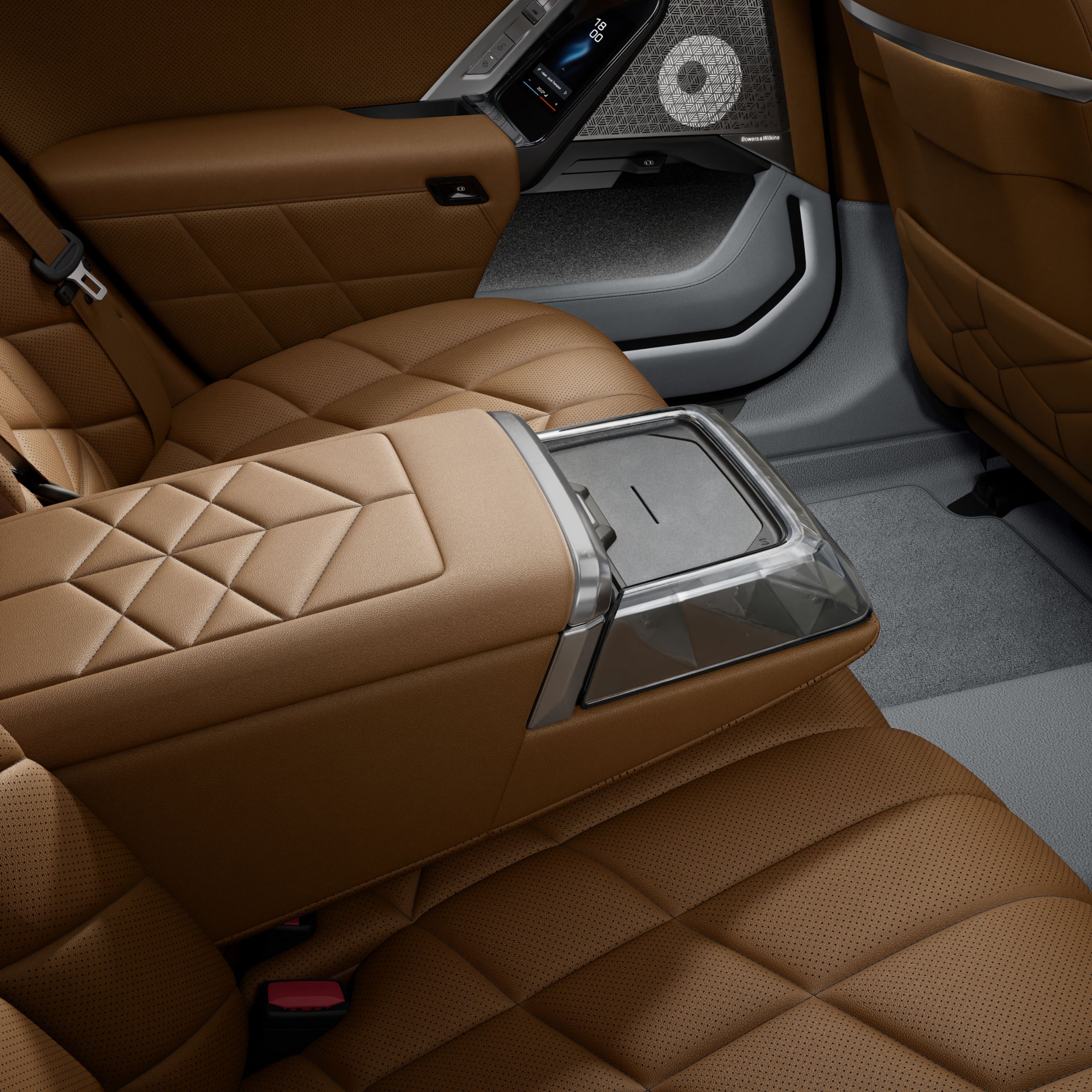 Close-up of the wireless charging cradle in the rear center console.