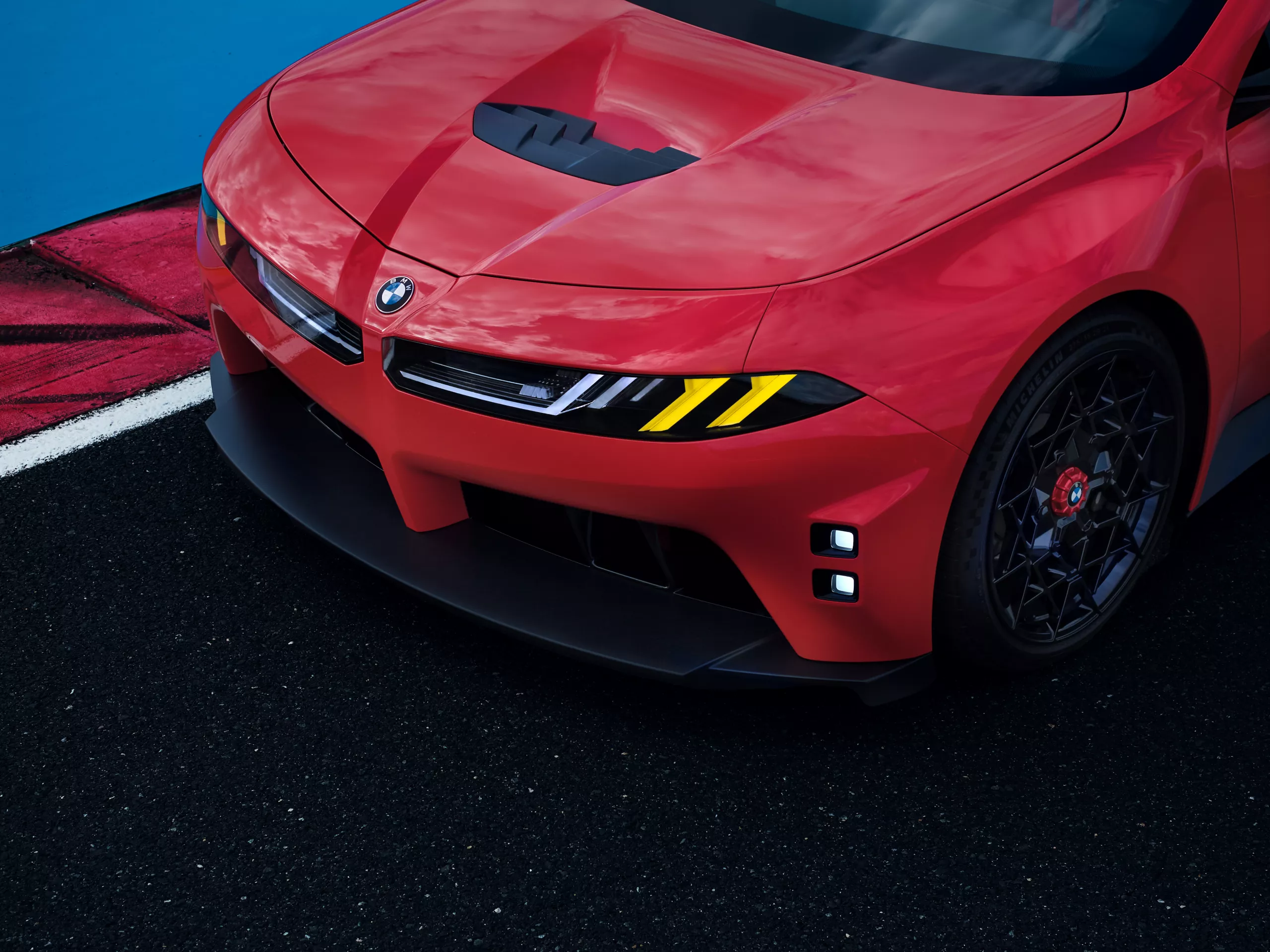 BMW M Concept Neue Klasse front with sharknose and yellow lights.