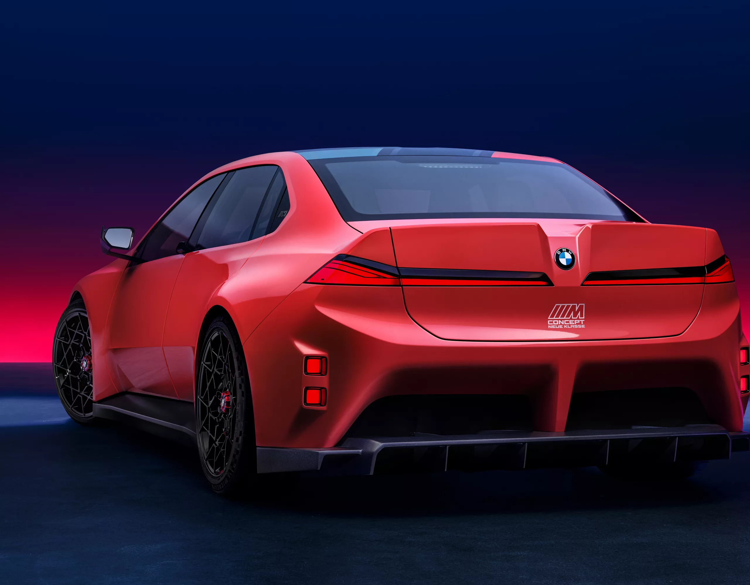BMW M Concept Neue Klasse rear with diffuser and track lights.