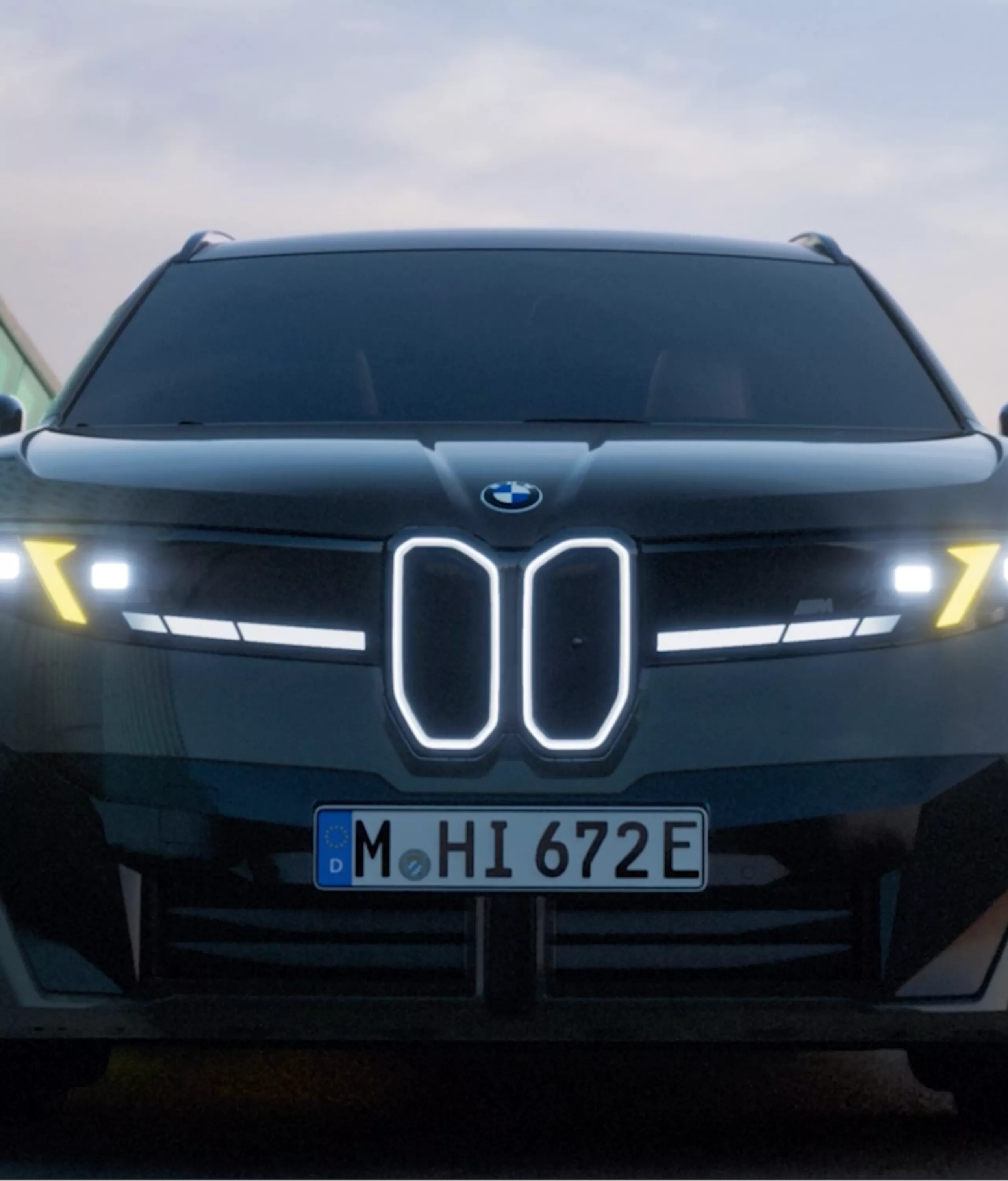 A dramatic front image of the BMW iX3 M60 xDrive