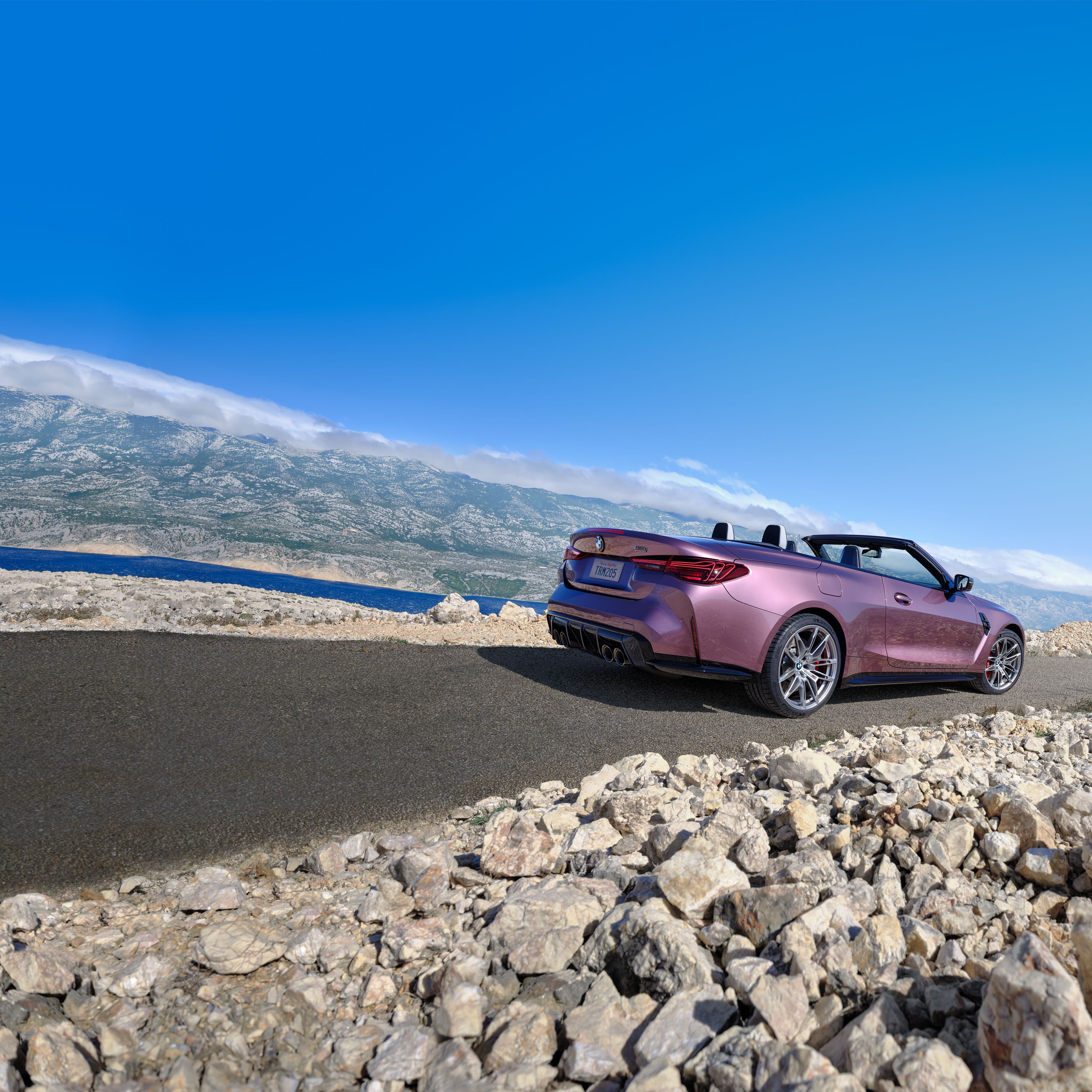 BMW M4 Competition xDrive Convertible shown in BMW Individual Velvet Orchid paint finish