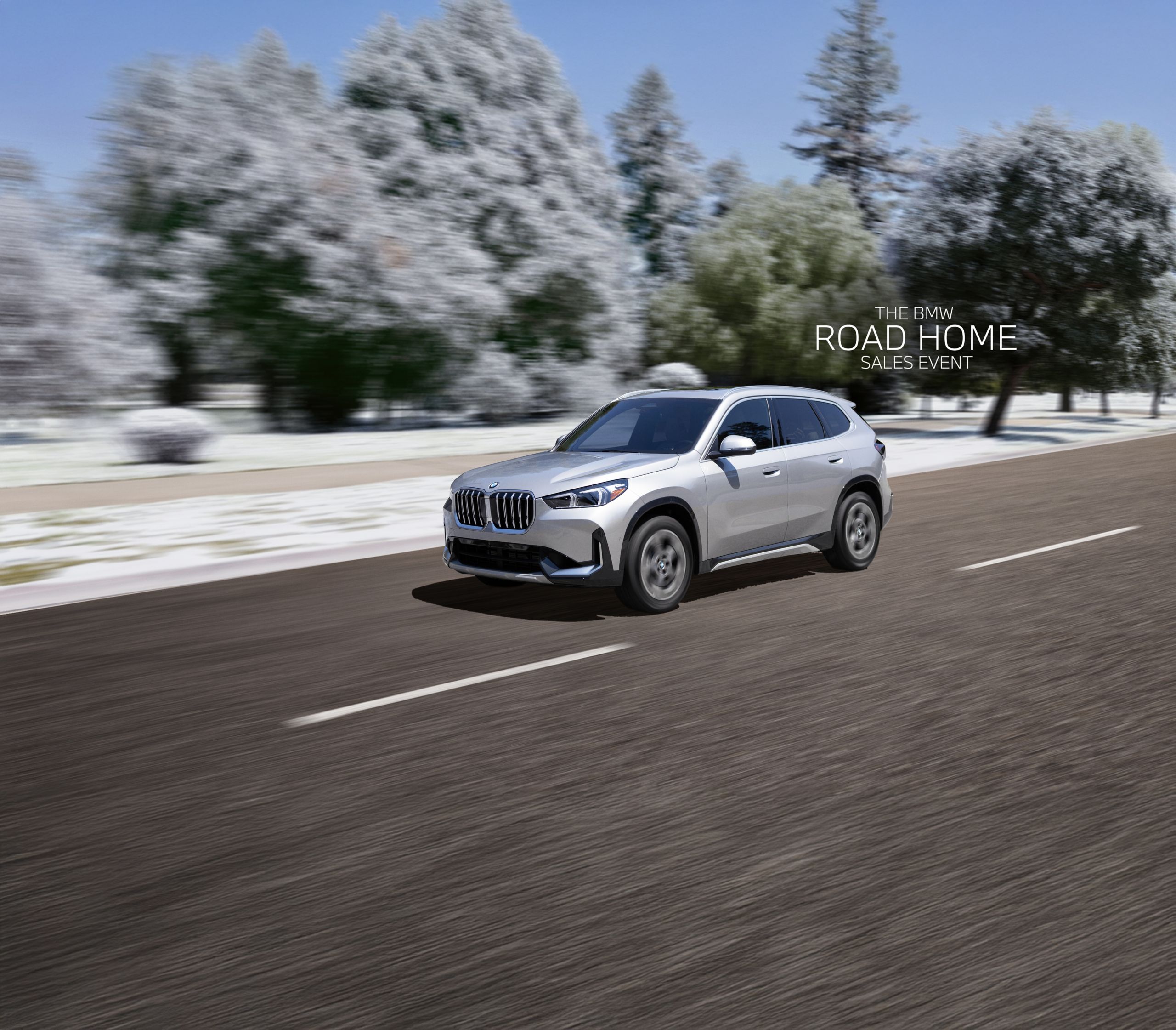 A 2026 BMW X1 xDrive28i SUV drives through a scenic neighborhood