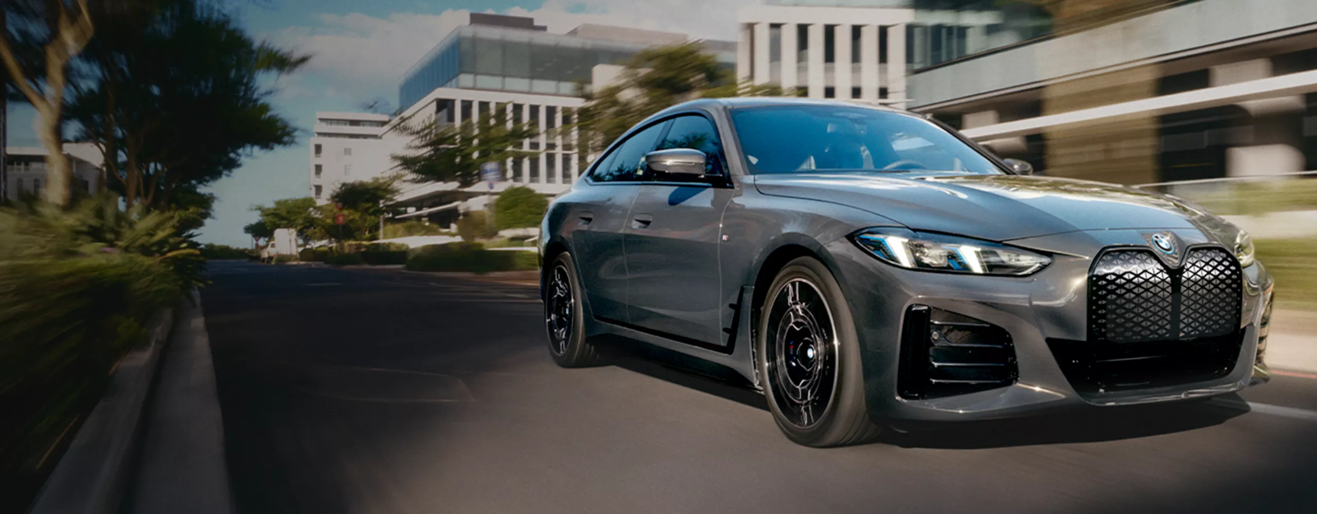 A dynamic driving video showcases the vehicle from all angles as it navigates winding roads through a scenic landscape, driven by a male model.