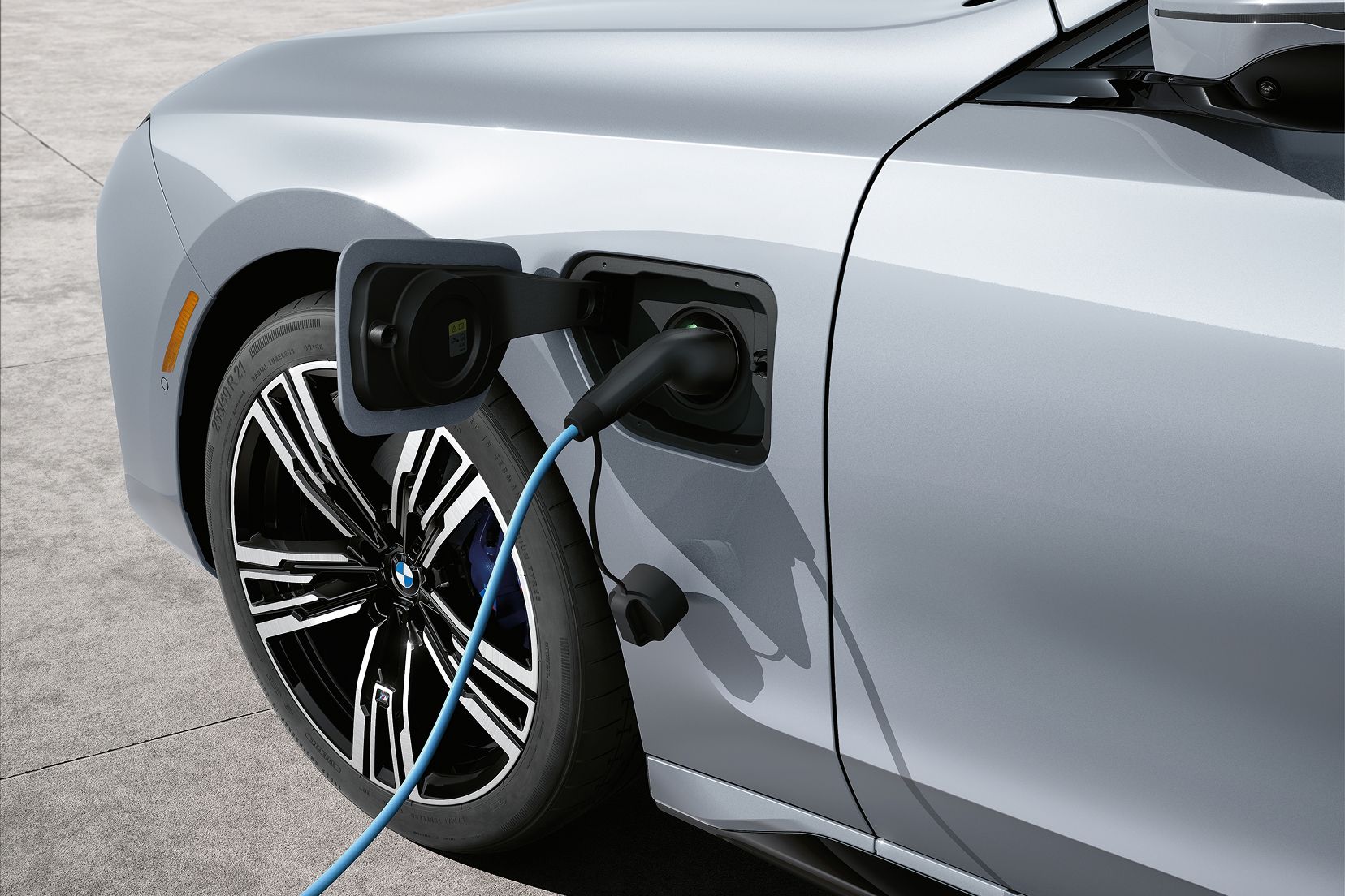 A charging cable plugged into a BMW vehicle