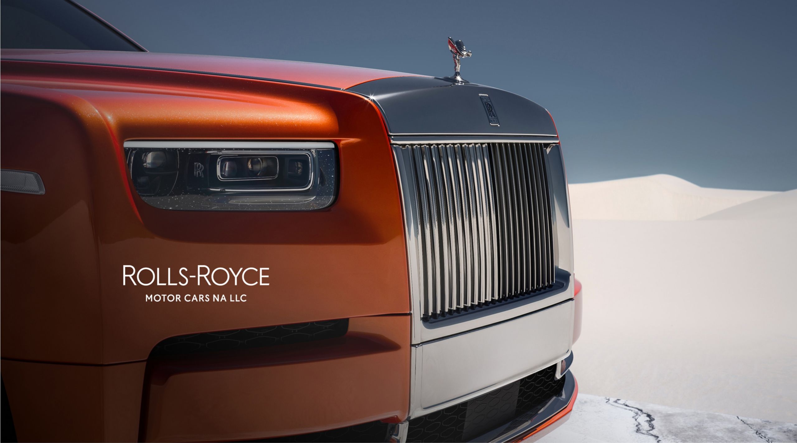 A quarter shot of the front of a Rolls Royce