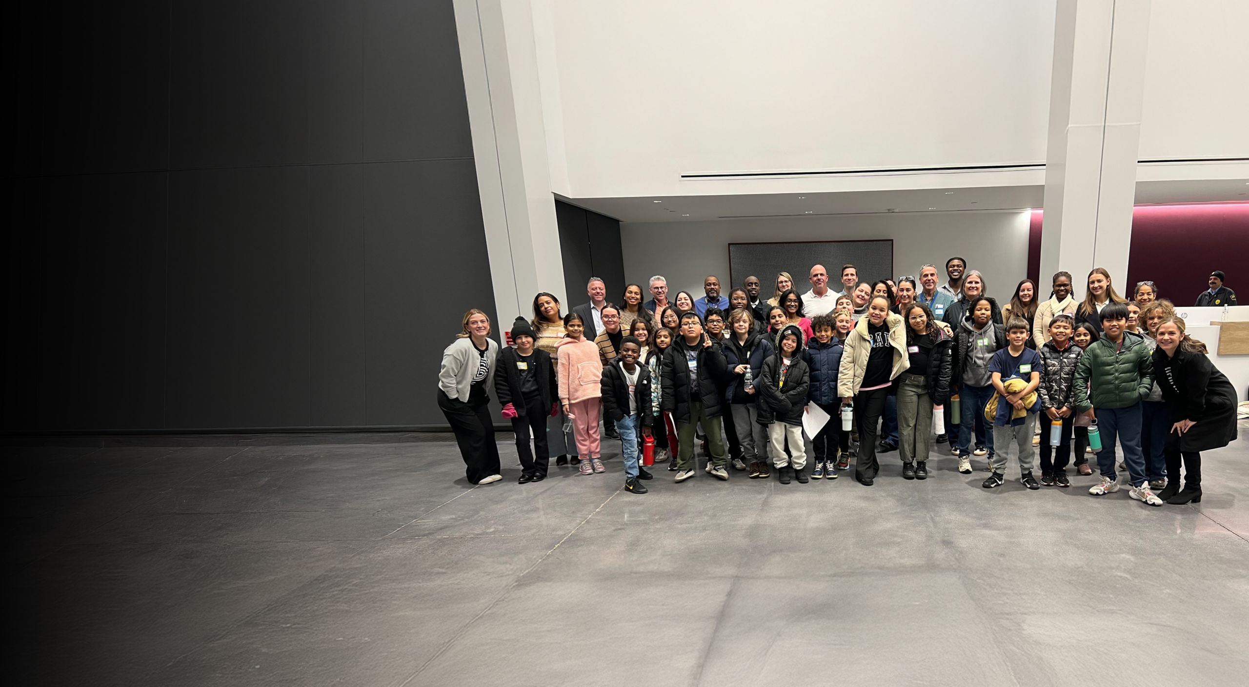 A shot of the Big Brothers Big Sisters group and the BMW team