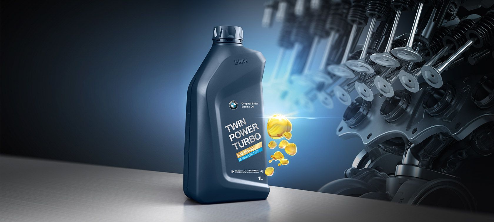 BMW engine oil man and woman lying on the bonnet of a BMW