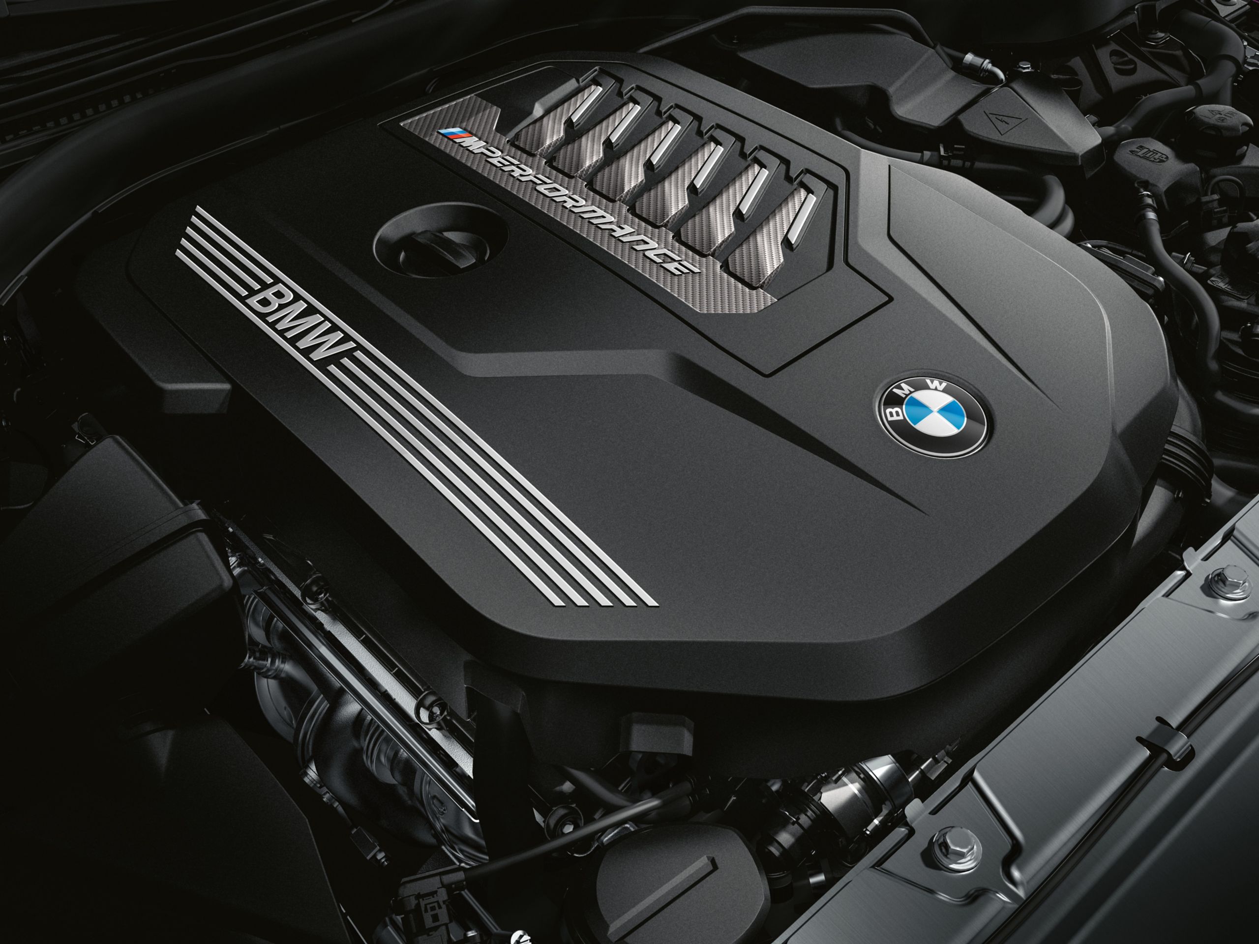 The 6-cylinder BMW M TwinPower Turbo engine of the BMW 340i Sedan
